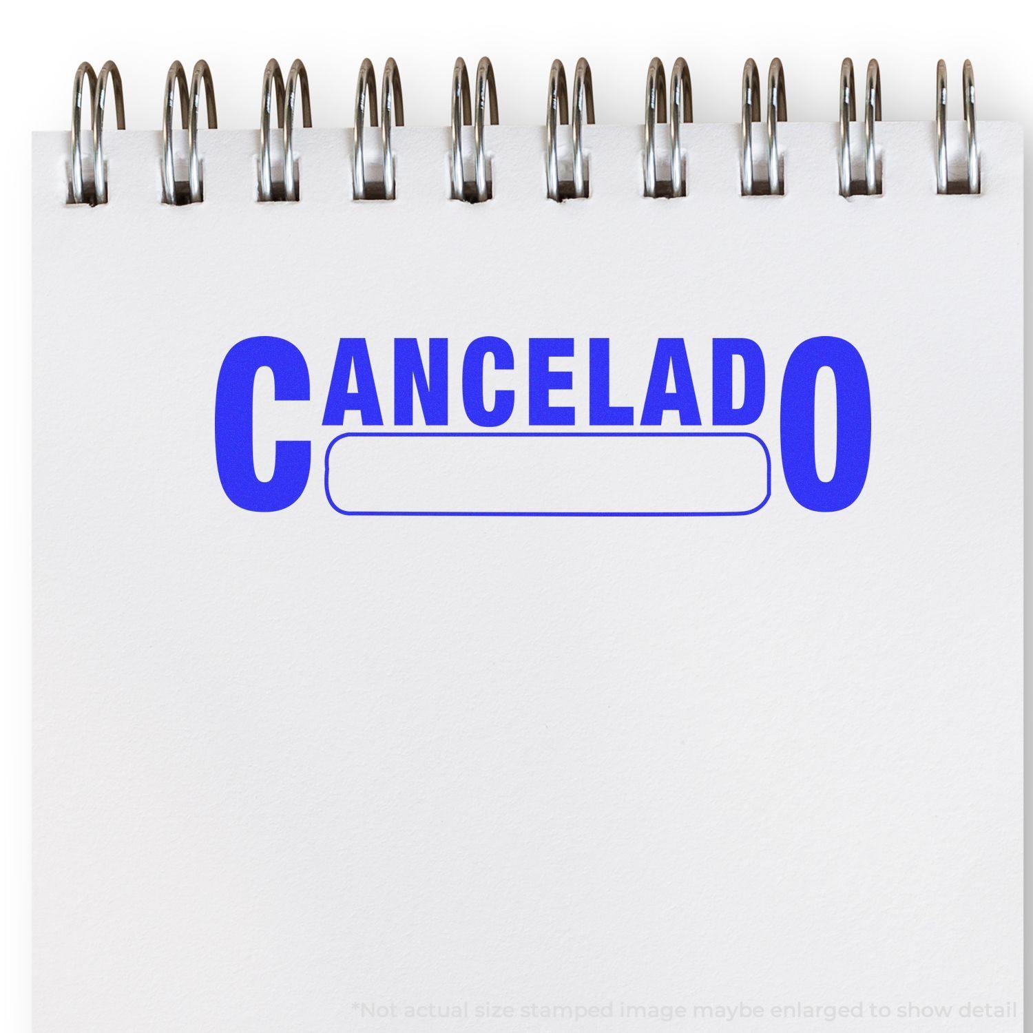 Cancelado with Box Rubber Stamp imprint in blue ink on a white notepad, showing the word 'Cancelado' with a blank box underneath.