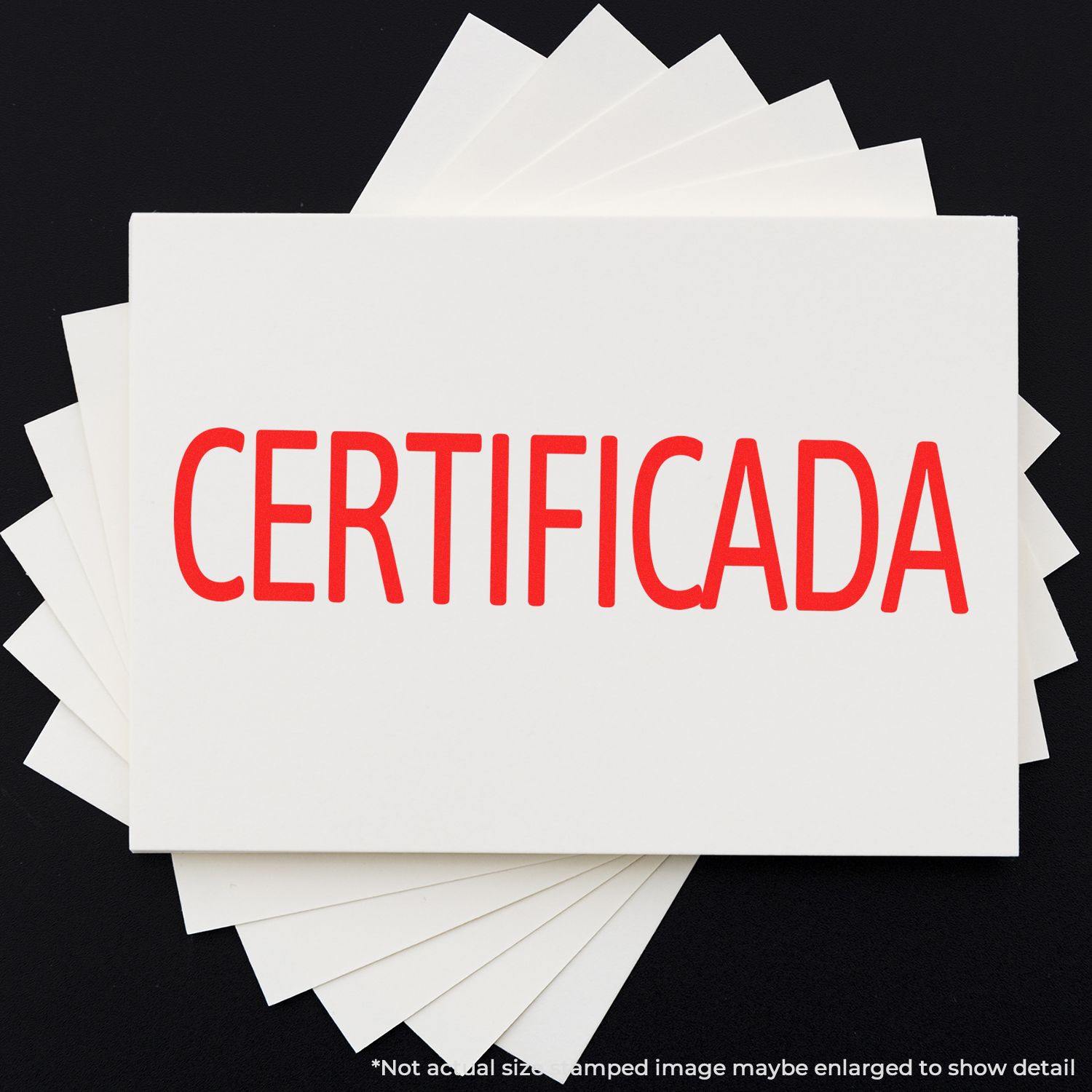 Self Inking Certificada Stamp in red ink on white paper, displayed on a black background with additional white sheets underneath.