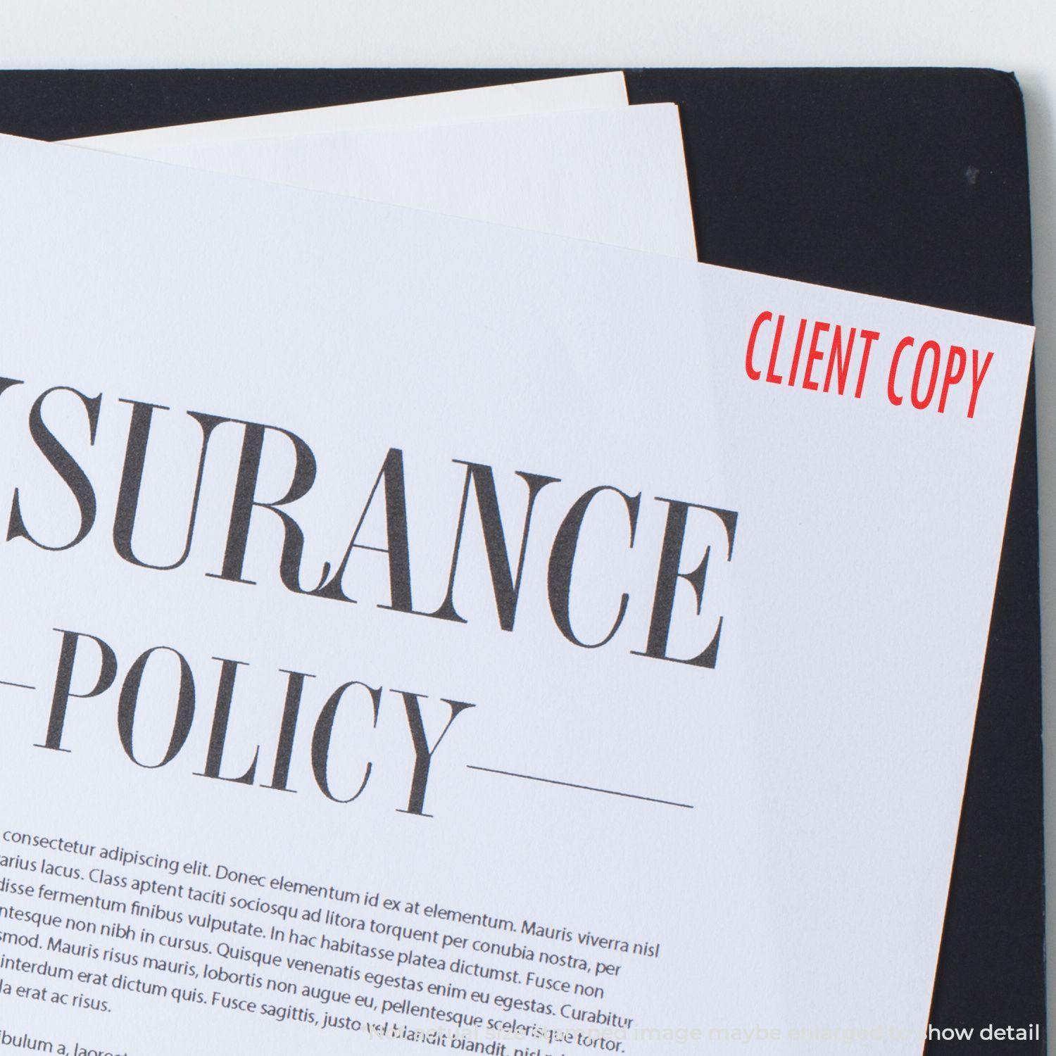 A document labeled Insurance Policy with Client Copy stamped in red using a Client Copy Rubber Stamp.