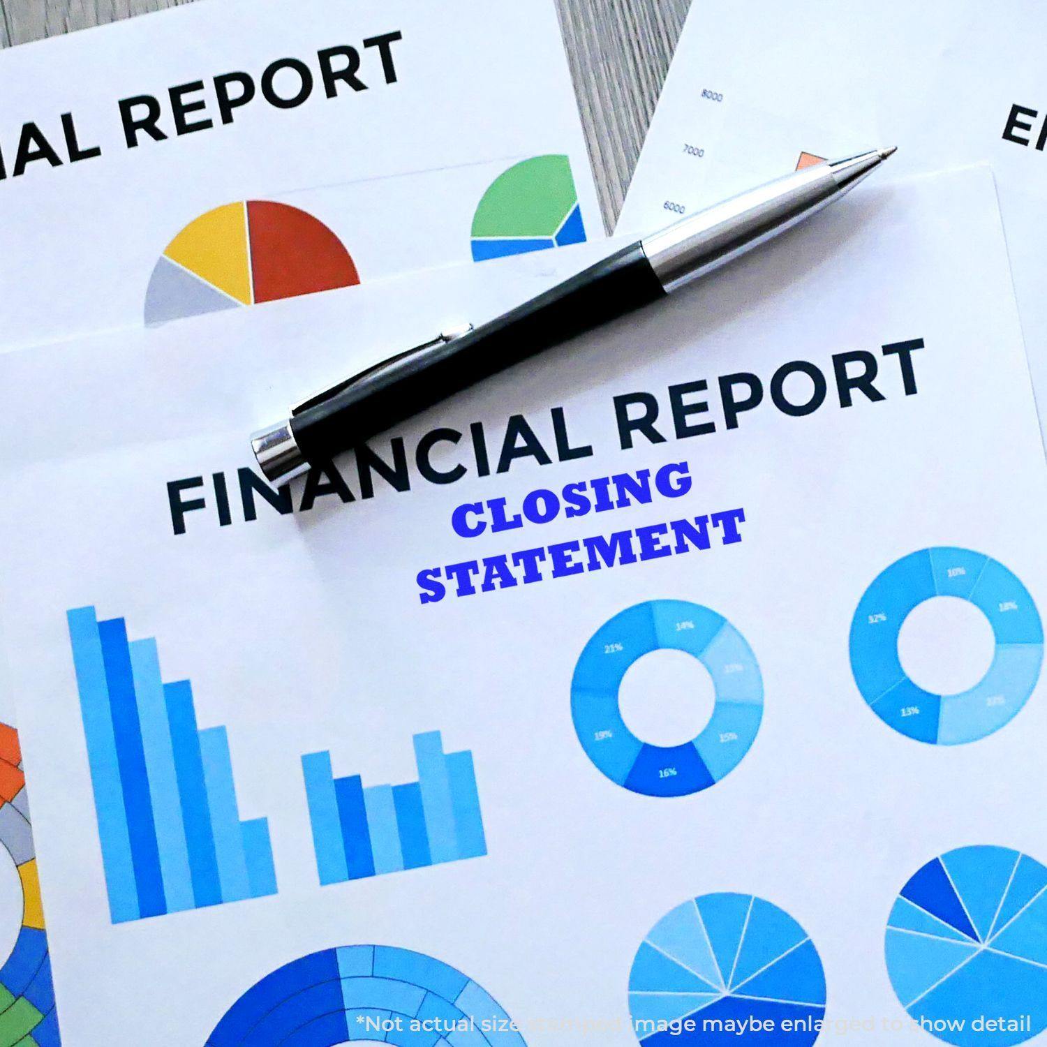 Financial reports with charts and graphs, featuring a Closing Statement Rubber Stamp in blue ink and a pen placed on top.