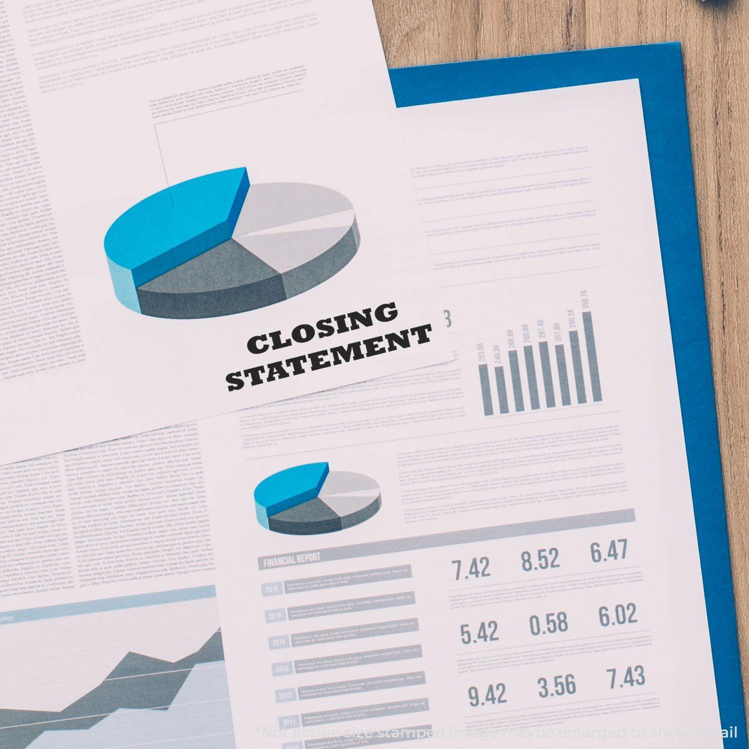 Large Self Inking Closing Statement Stamp used on a financial report with charts and graphs, highlighting the 'Closing Statement' text in bold black letters.