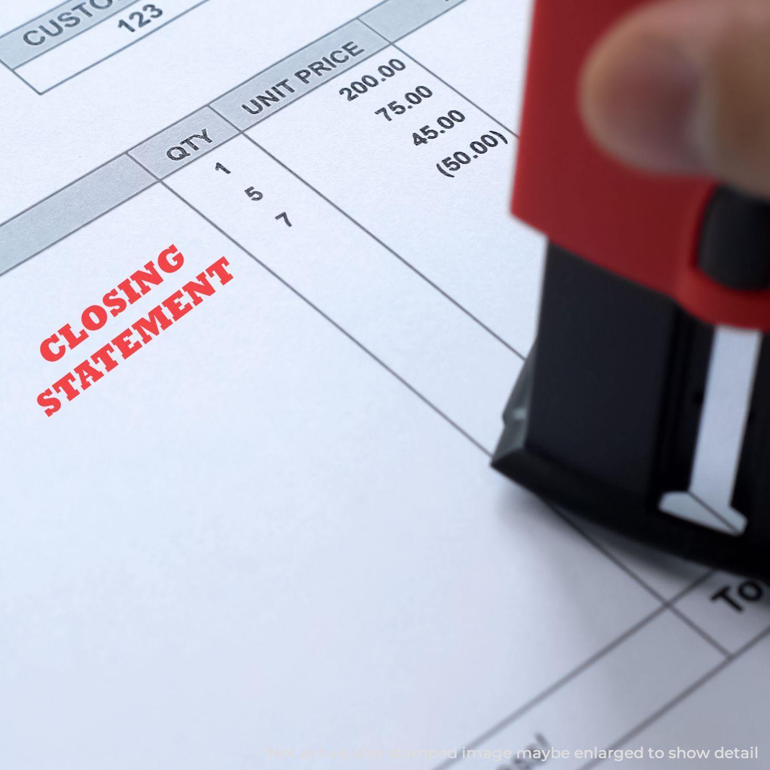 Slim Pre-Inked Closing Statement Stamp marking a document with CLOSING STATEMENT in red ink on a financial statement.