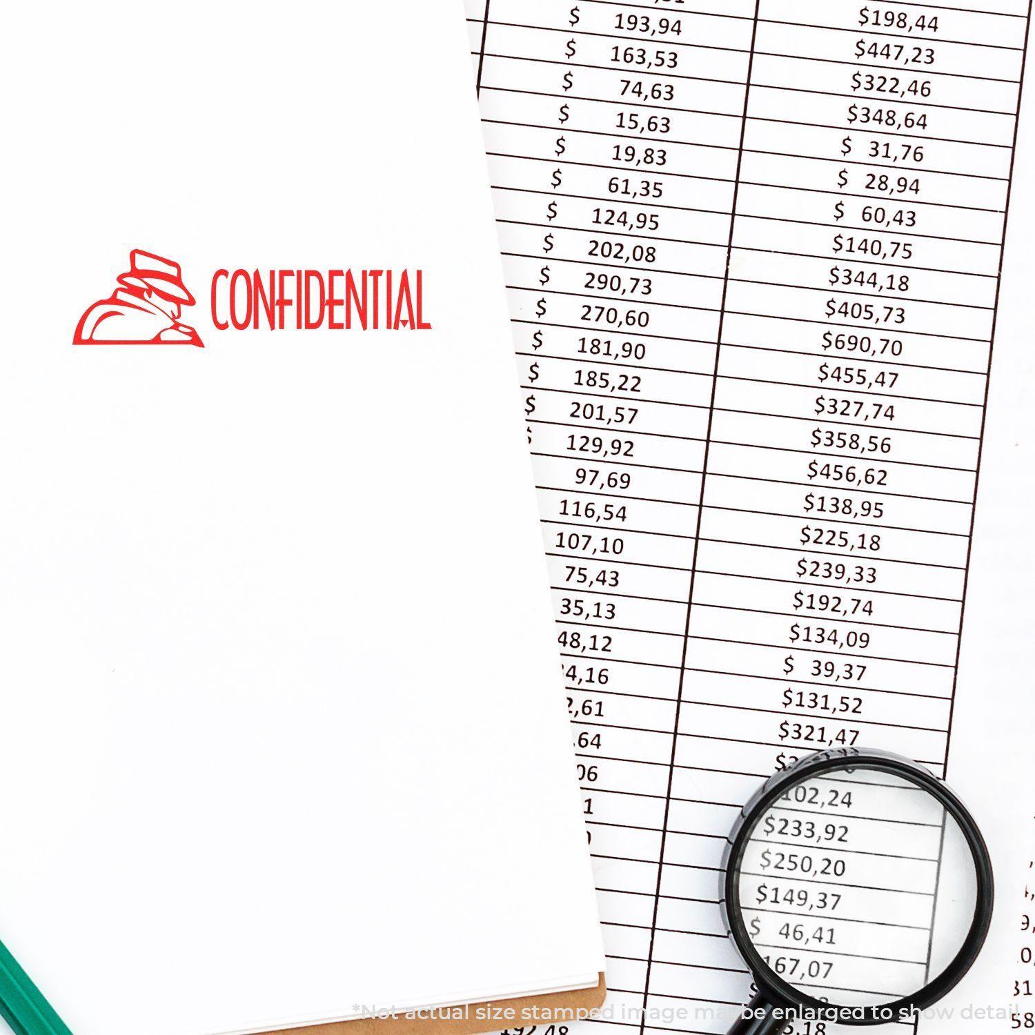 Slim Pre-Inked Confidential with Logo Stamp on paper next to a financial spreadsheet and magnifying glass.