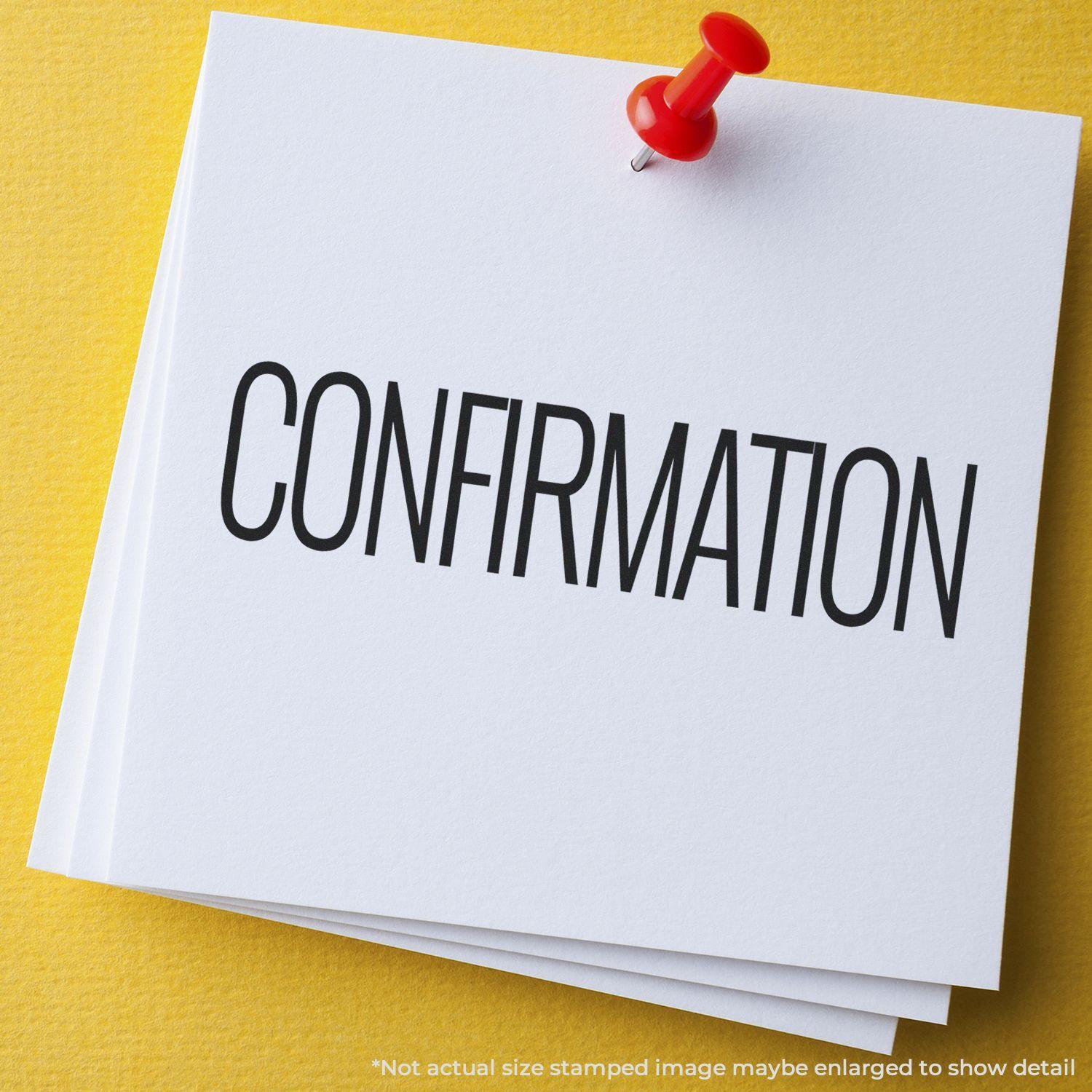 A stack of white papers with the word CONFIRMATION stamped in bold black letters using the Large Self Inking Confirmation Stamp, pinned together with a red pushpin on a yellow background.