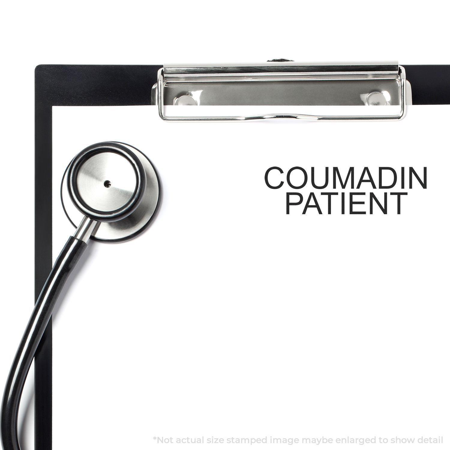 Clipboard with stethoscope and COUMADIN PATIENT stamped on paper, demonstrating the use of the Coumadin Patient Rubber Stamp.