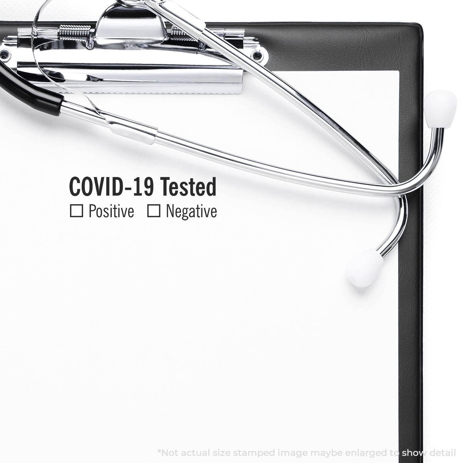 Covid-19 Tested rubber stamp on a clipboard with checkboxes for Positive and Negative, accompanied by a stethoscope.