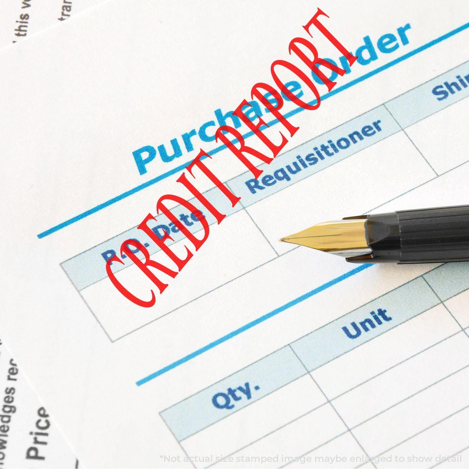 Large Self Inking Credit Report Stamp in red ink on a purchase order form, with a pen beside it.