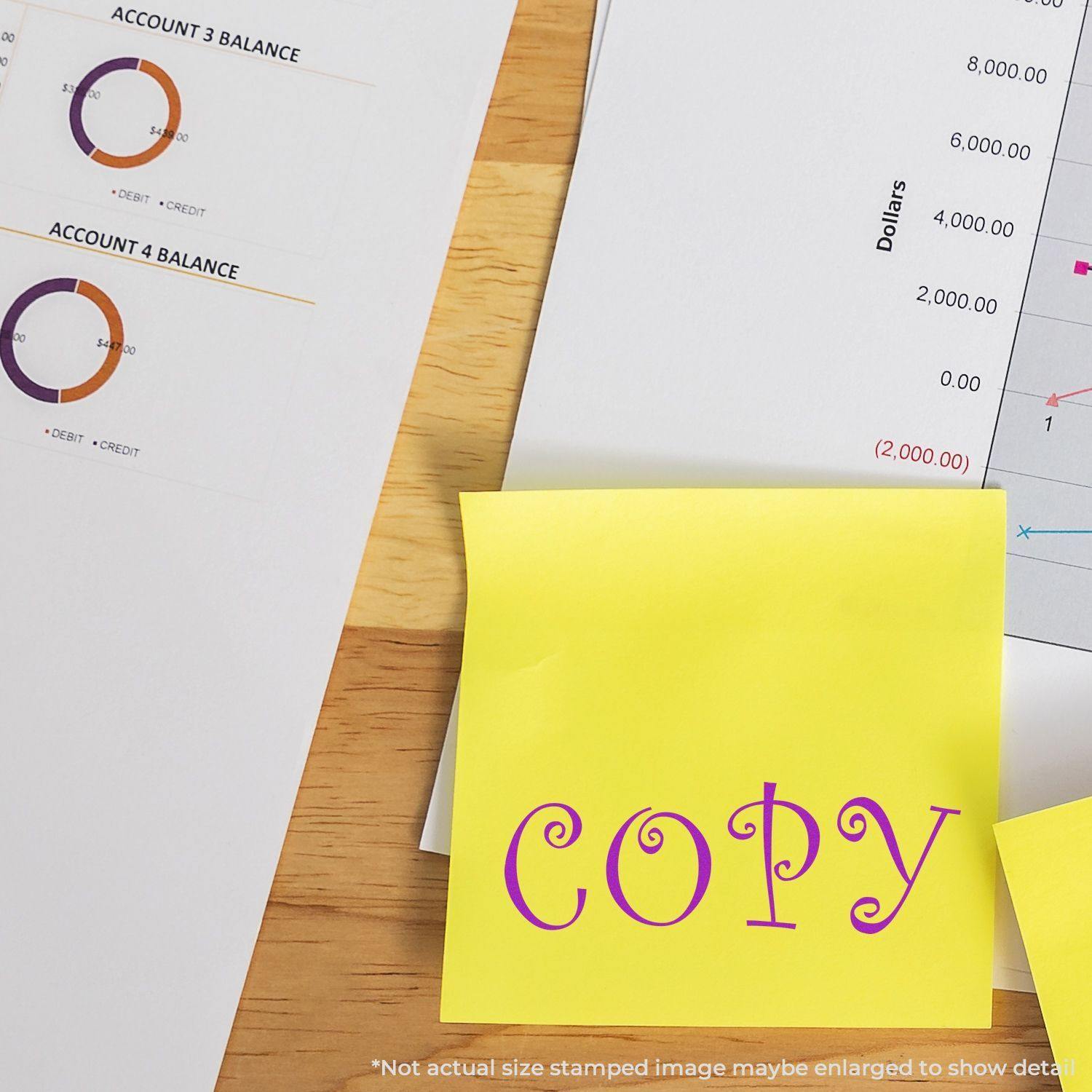 Self Inking Curly Copy Stamp used on a yellow sticky note with COPY text, placed on a wooden desk with financial documents.