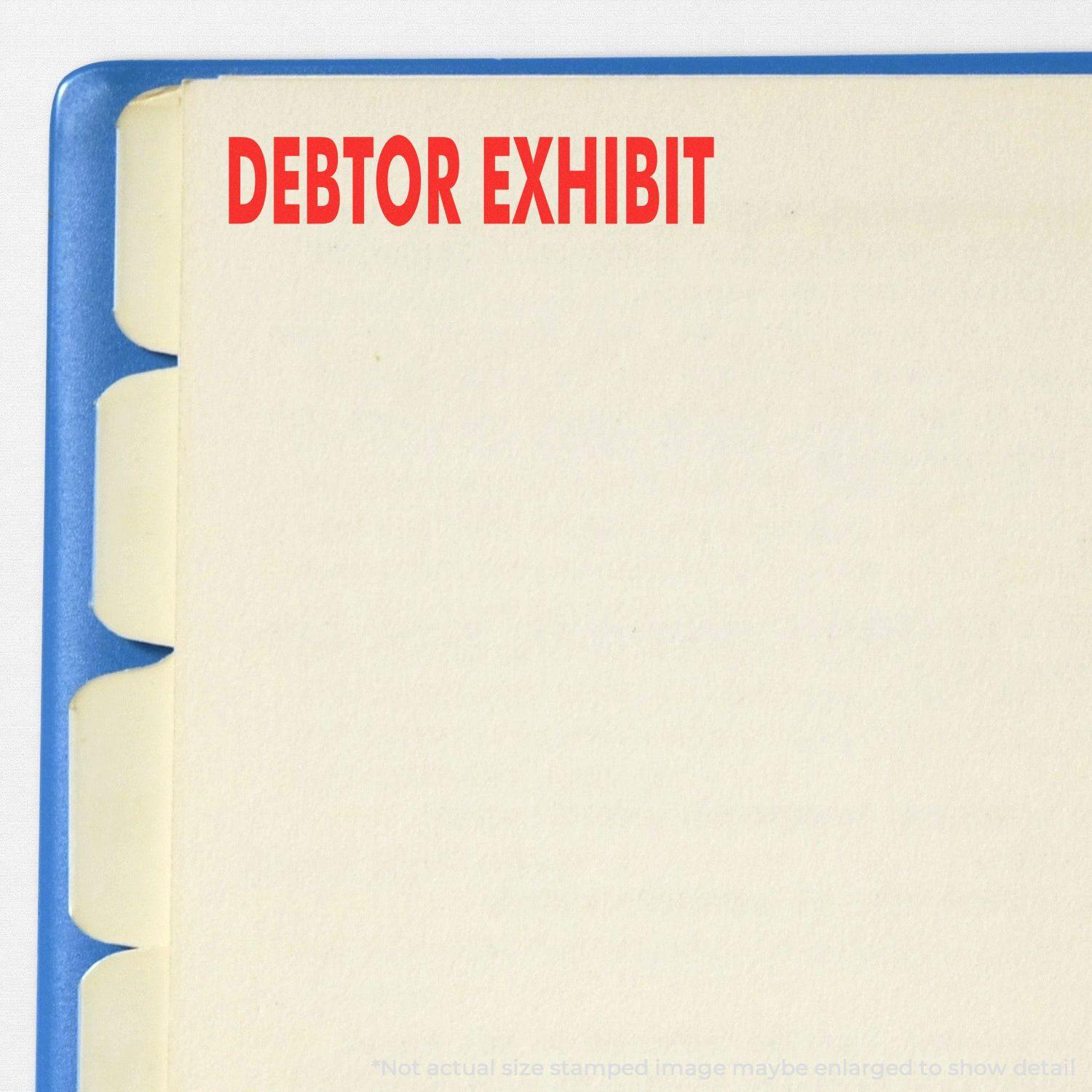 Slim Pre-Inked Debtor Exhibit Stamp used on a document with red DEBTOR EXHIBIT text on a yellow tabbed folder.