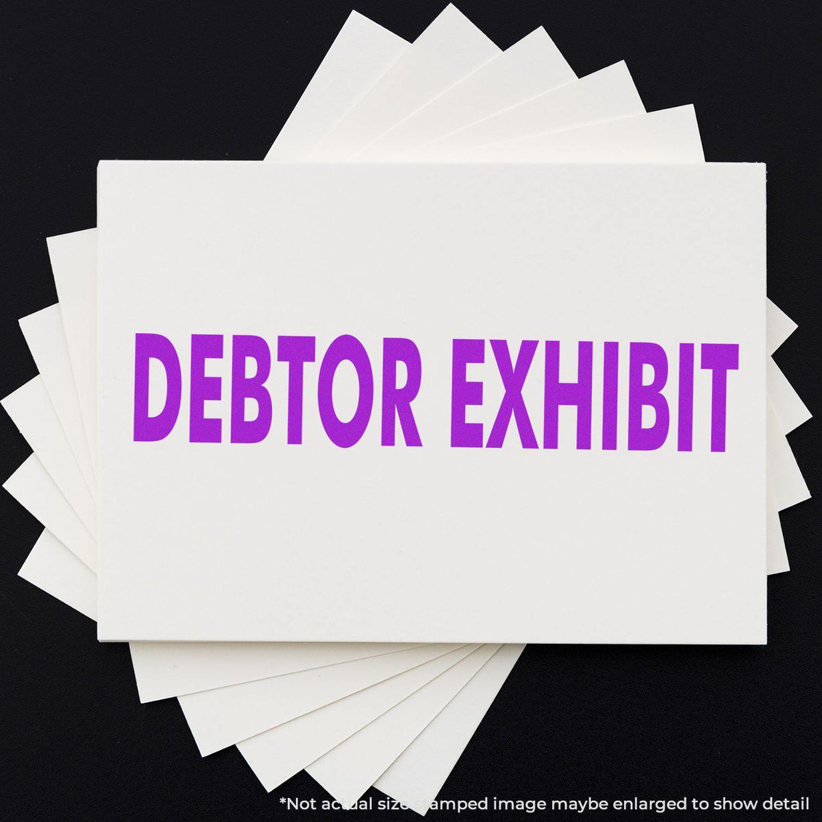 Large Debtor Exhibit Rubber Stamp In Use Photo