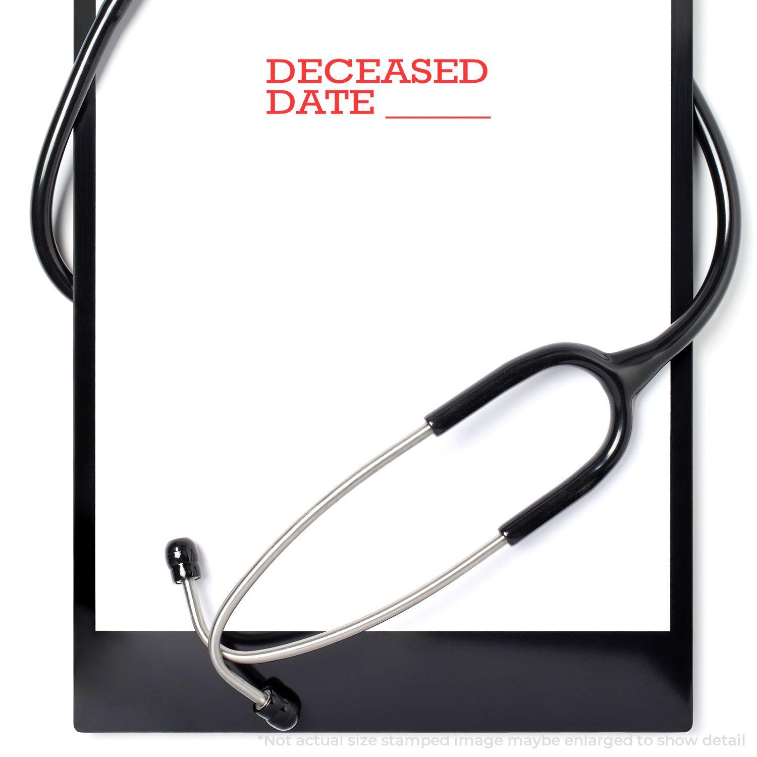 A clipboard with a stethoscope and a paper stamped with DECEASED DATE using the Deceased Date Rubber Stamp.