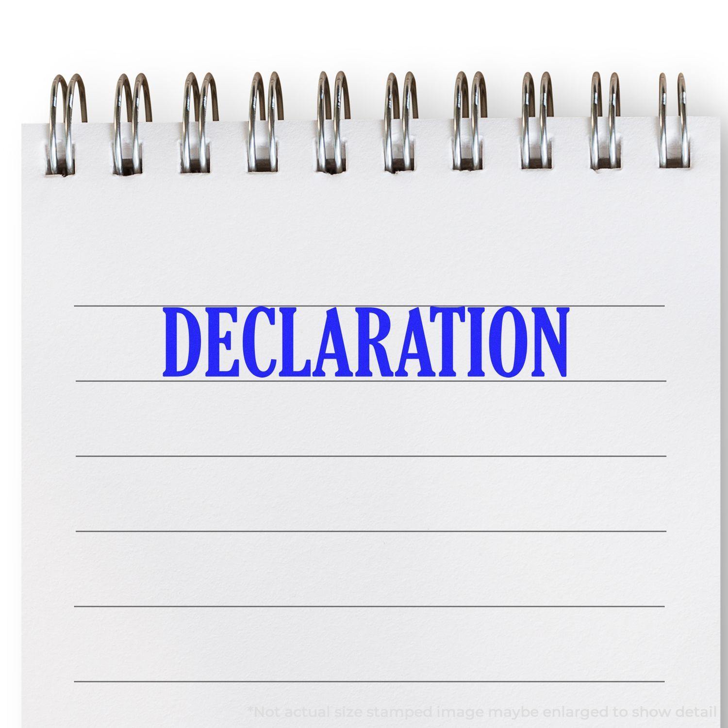 A stock office rubber stamp with a stamped image showing how the text "DECLARATION" is displayed after stamping.