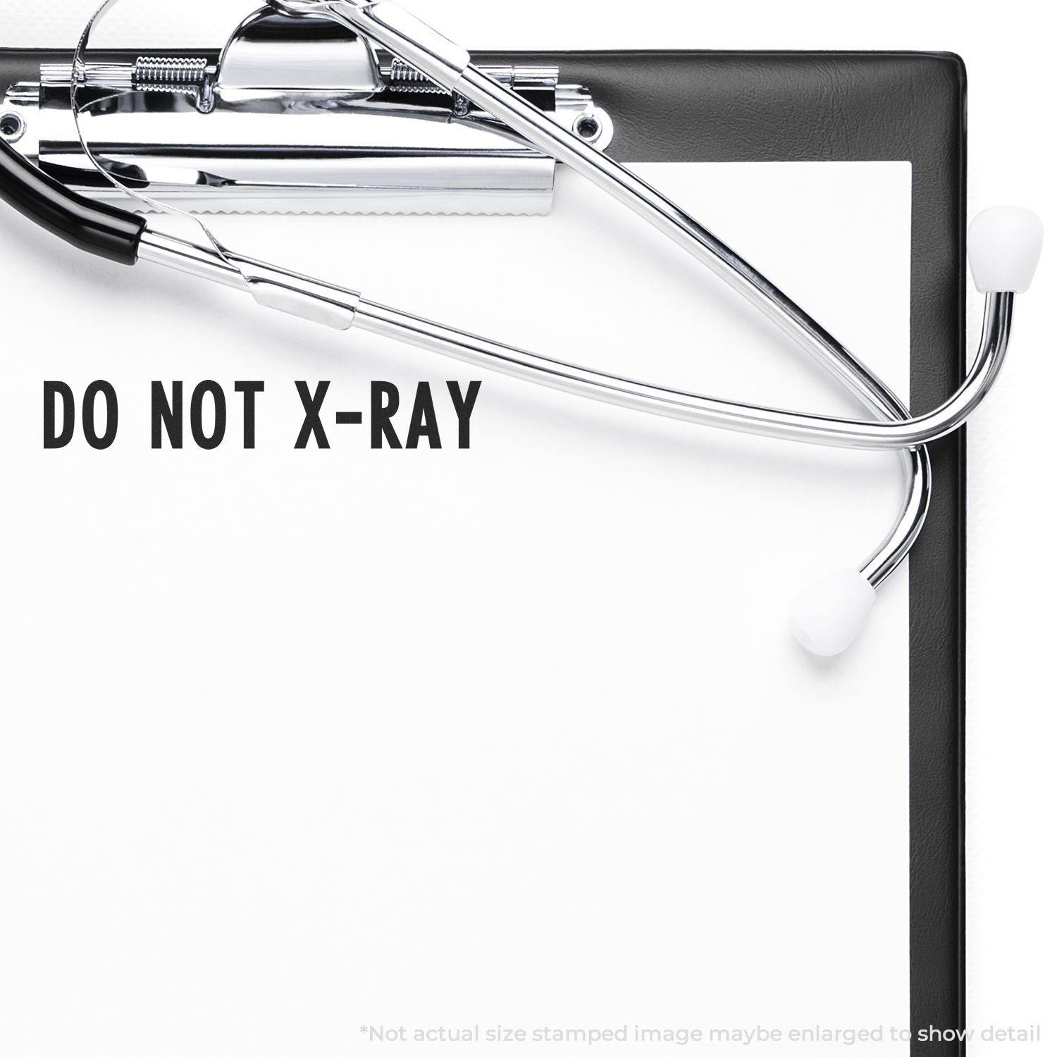 A notebook stamped with DO NOT X-RAY using the Do Not X-Ray Rubber Stamp, surrounded by medical items on a blue background.