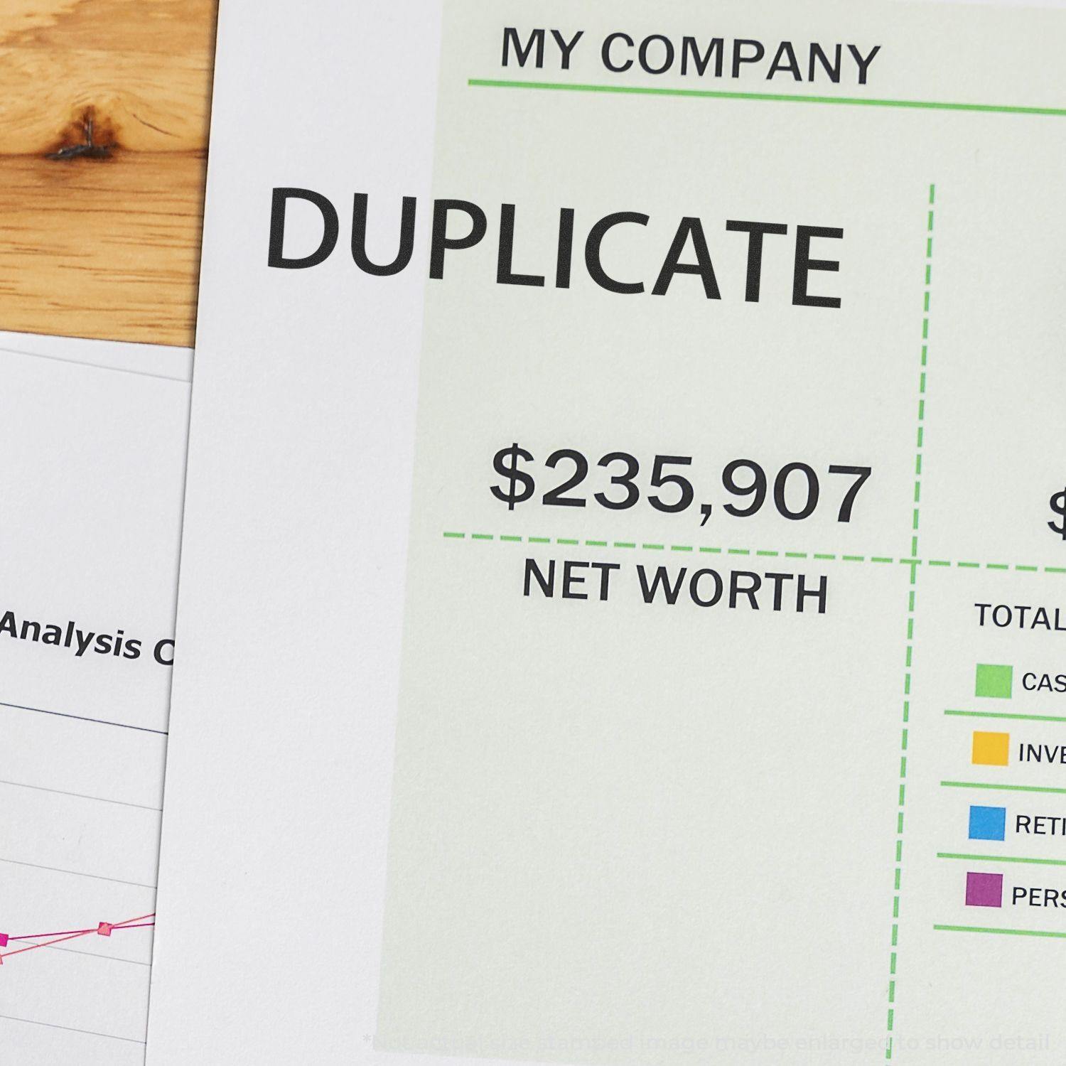 A document stamped with DUPLICATE using a Self Inking Duplicate Stamp, showing financial data and a net worth of $235,907.