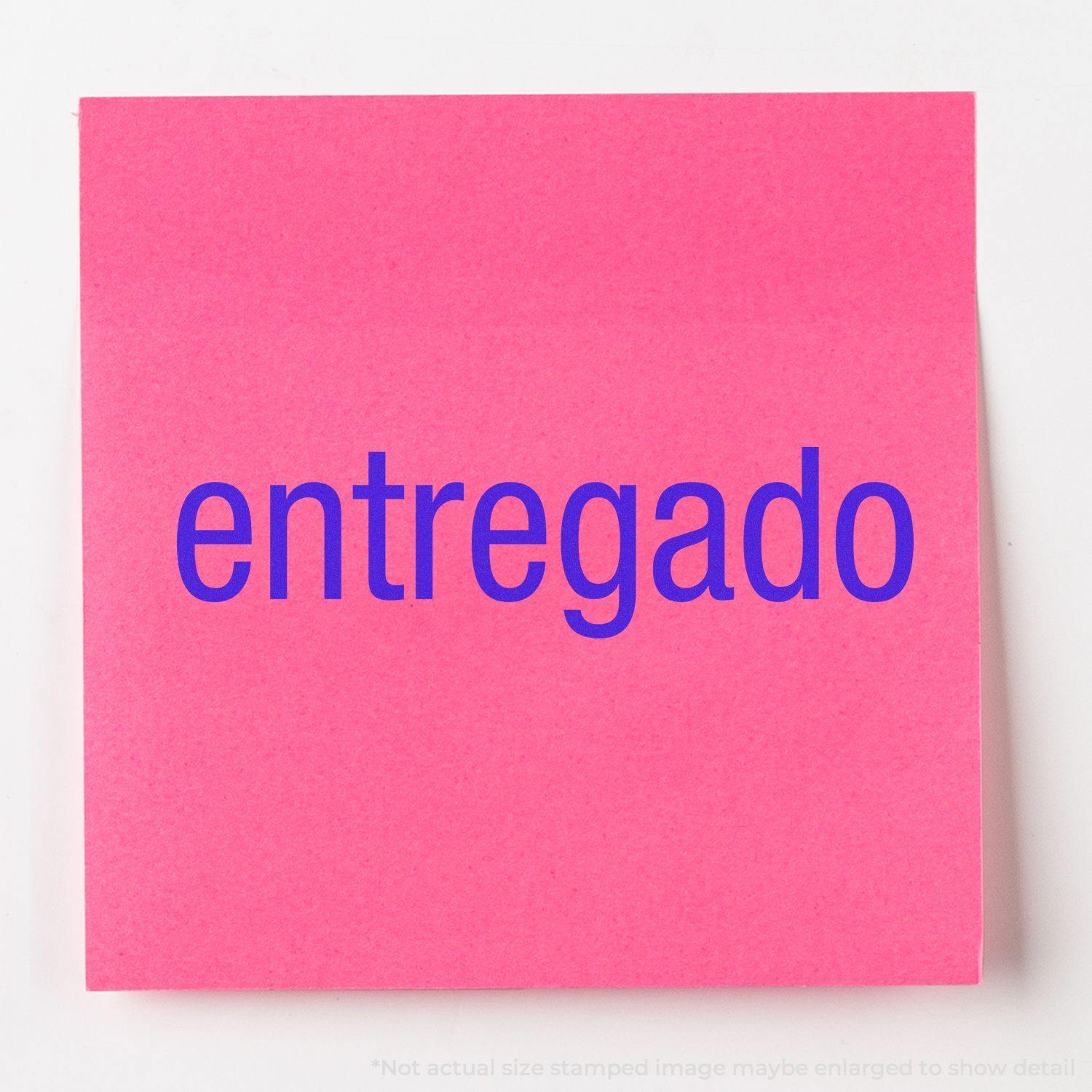 A self-inking stamp with a stamped image showing how the text "entregado" in a large font is displayed by it after stamping.