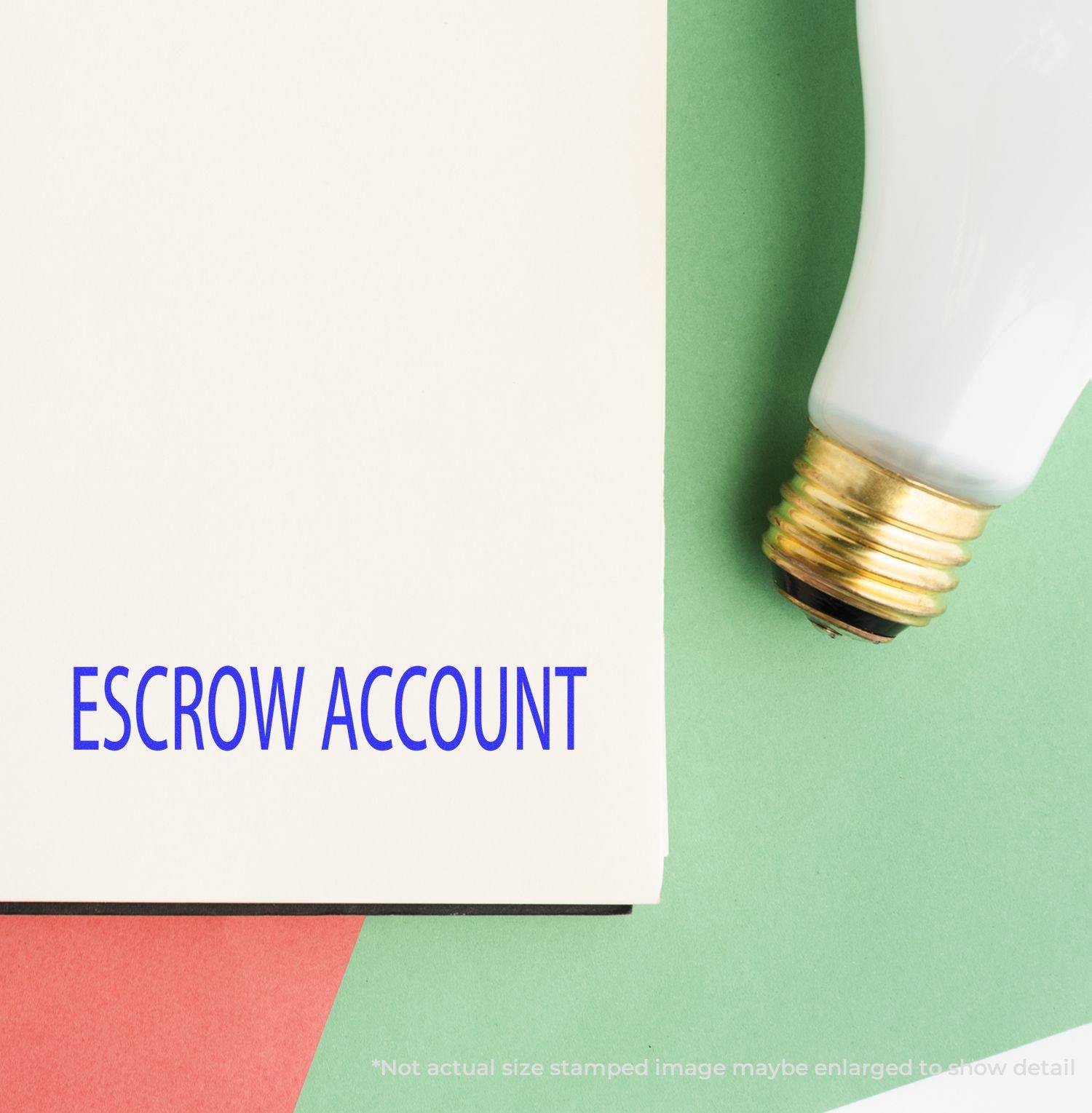 Escrow Account Rubber Stamp imprint on a white paper, placed on a green and red background with a light bulb nearby.