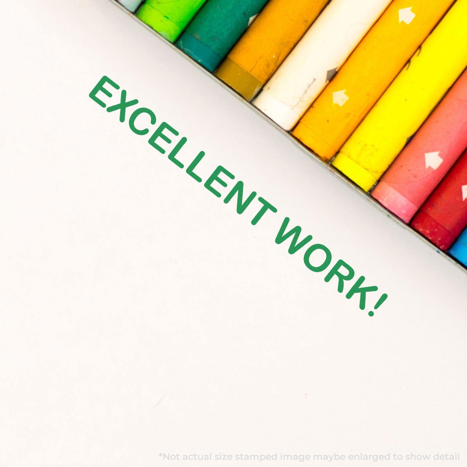 Excellent Work Rubber Stamp in green ink on white paper, surrounded by colorful crayons at the top edge.