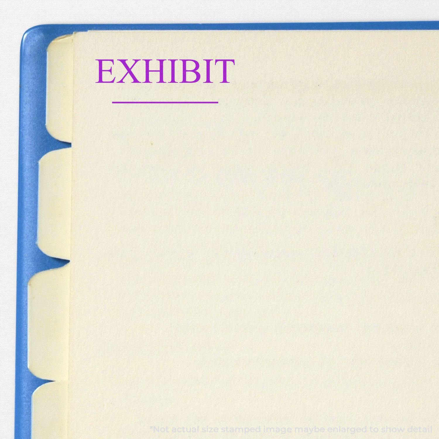 A Self Inking Exhibit Stamp imprint in purple ink on a document with tabbed dividers, showing the word EXHIBIT at the top left corner.