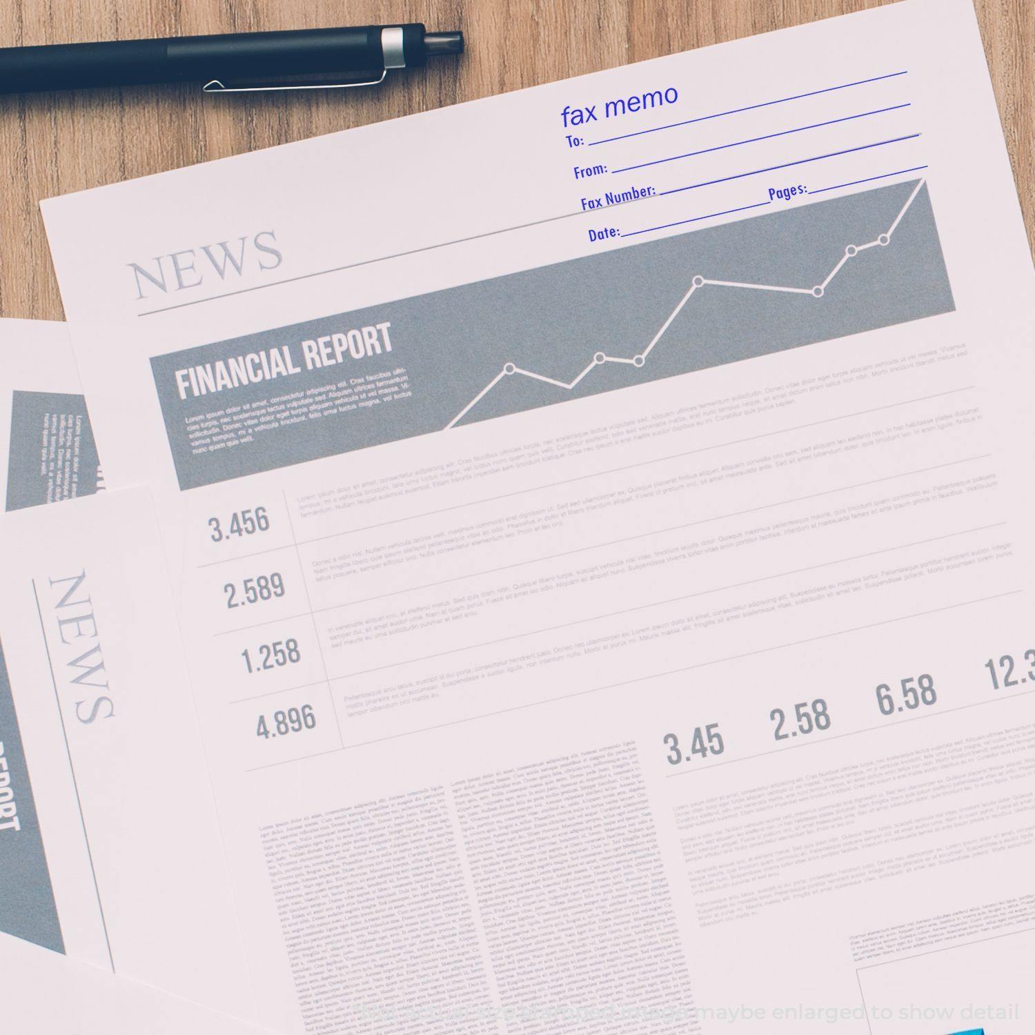 Person using Slim Pre-Inked Fax It 2 Stamp on a financial report document, with a pen placed nearby on a wooden desk.