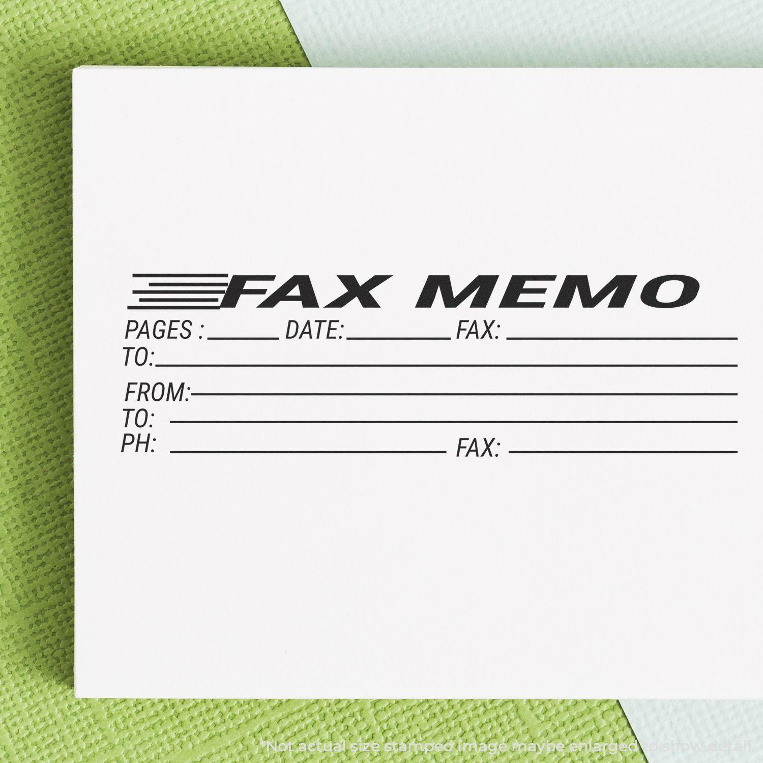 Fax Memo Rubber Stamp imprint on white paper with fields for pages, date, fax, to, from, phone, and fax numbers, placed on a green surface.