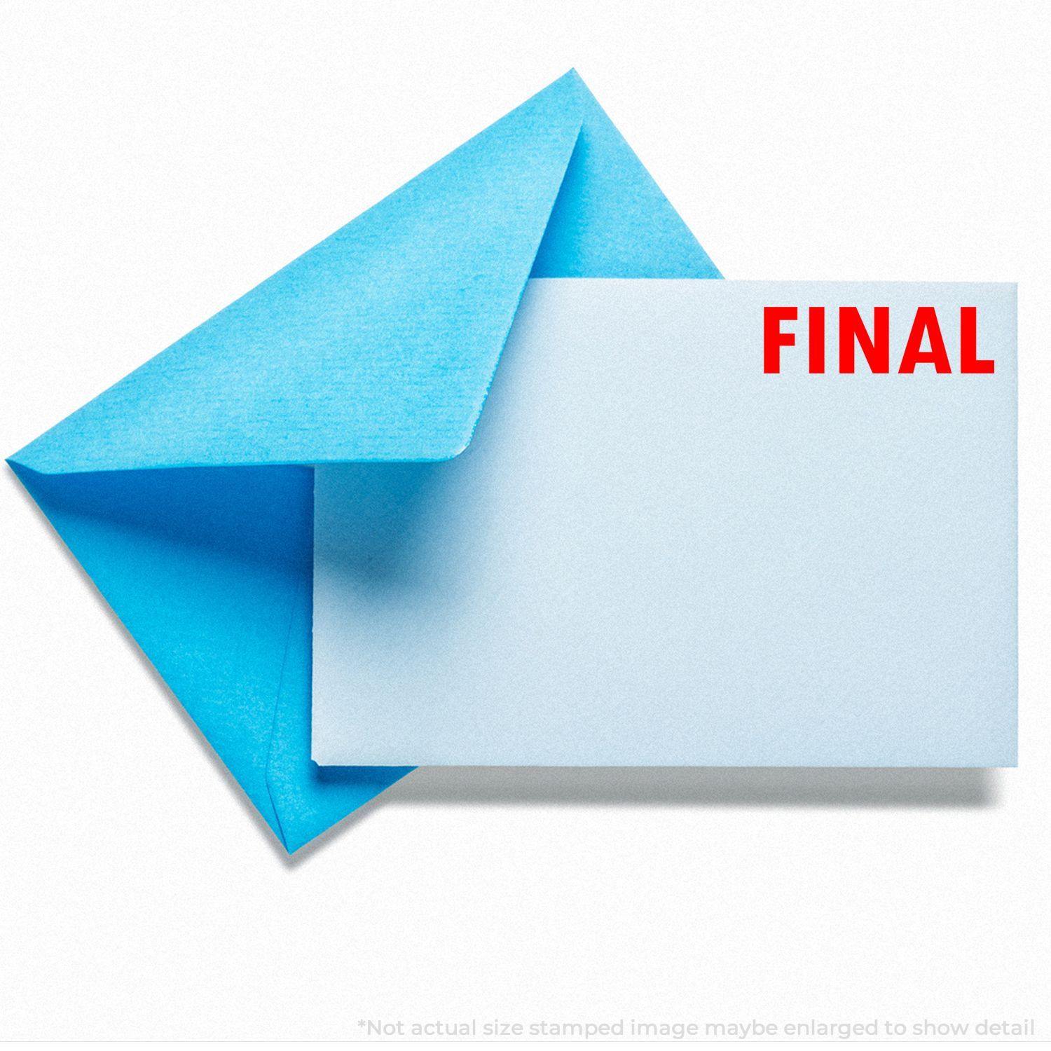 Blue envelope with a white card stamped "FINAL" in red using the Final Rubber Stamp.