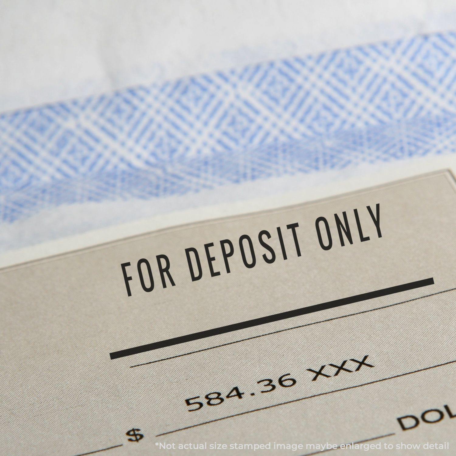 A close-up of a check stamped with For Deposit Only with Line Rubber Stamp, showing the stamped text and a partial view of the check details.