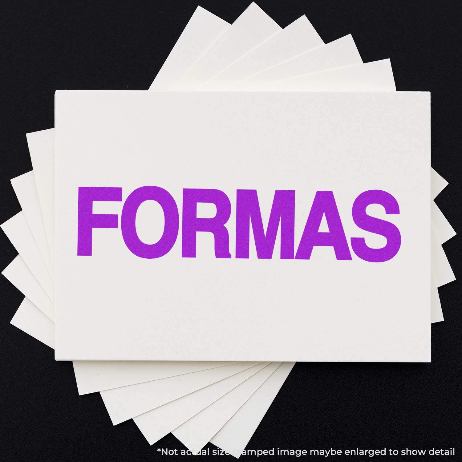 Formas Rubber Stamp in use, displaying the word FORMAS in bold purple letters on a white card, with multiple cards underneath.