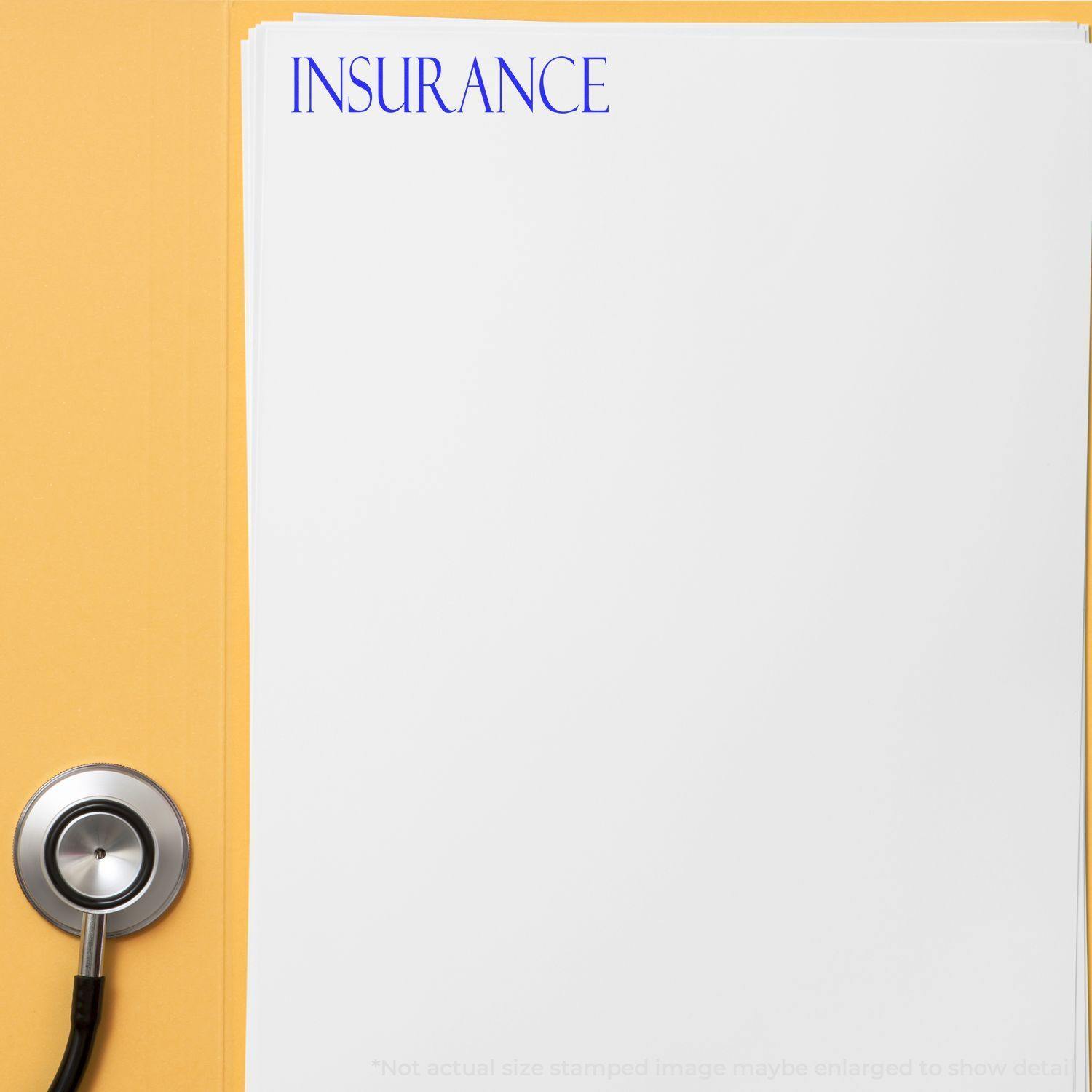 Insurance Rubber Stamp on a stack of white papers with a stethoscope on a yellow background.