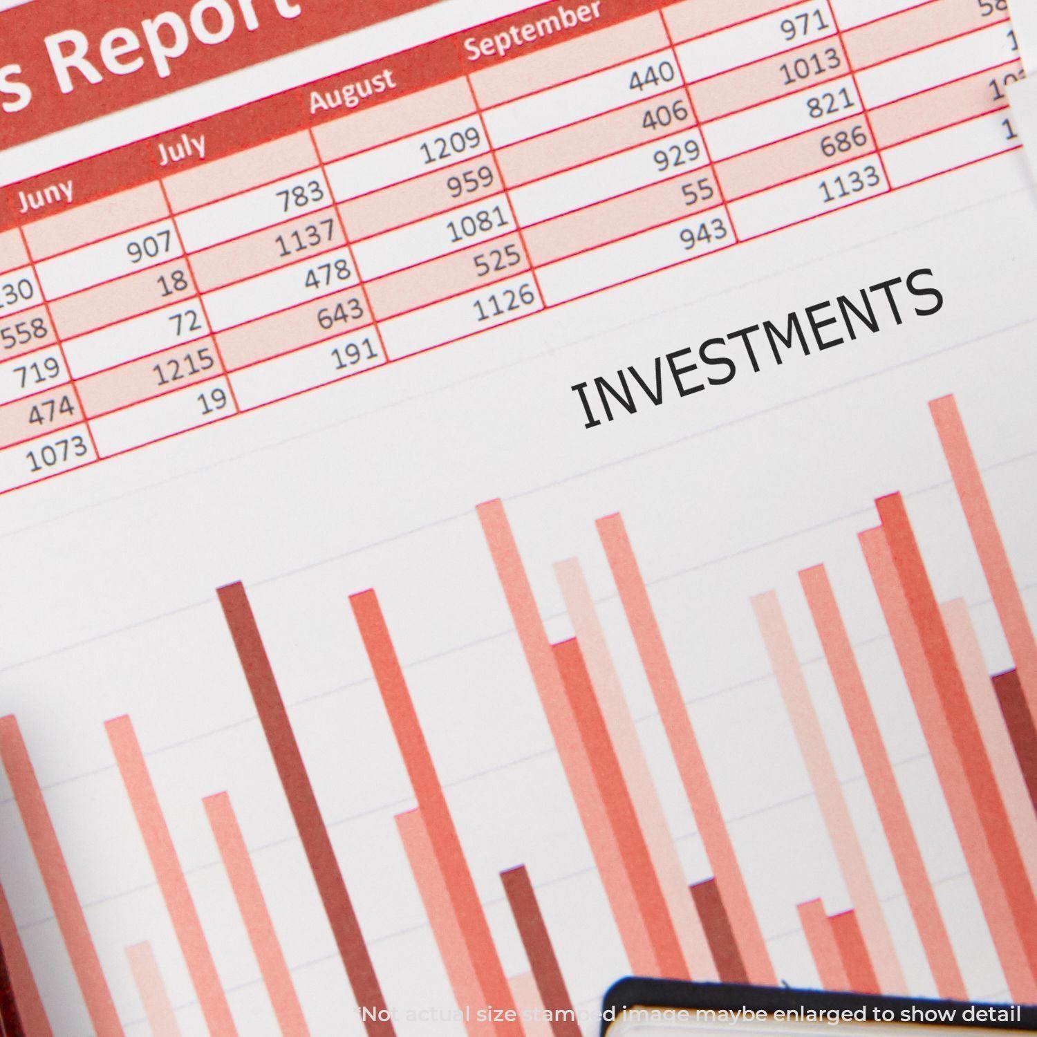 A financial report with bar graphs and a table, stamped with Investments using the Investments Rubber Stamp.