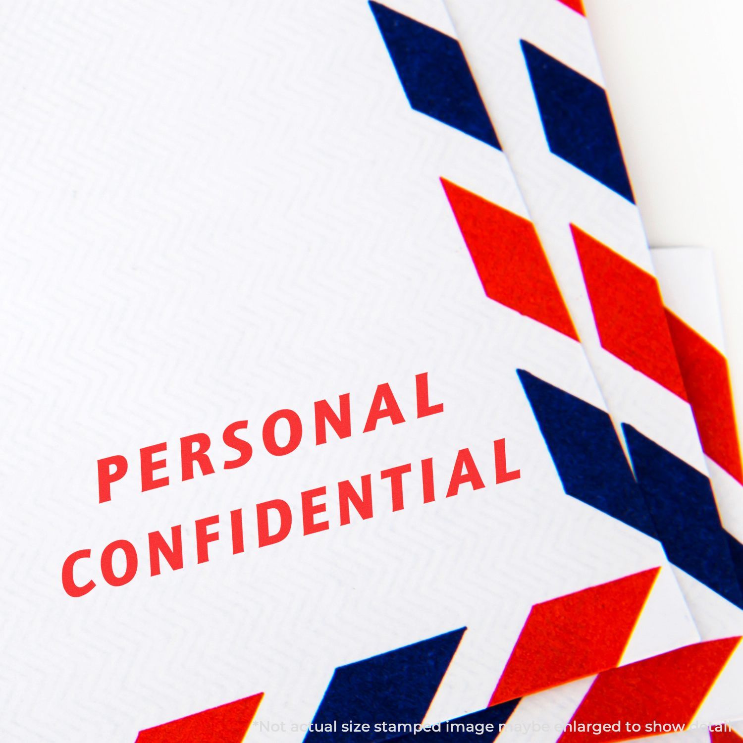 Close-up of a document stamped with PERSONAL CONFIDENTIAL using the Self Inking Italic Personal Confidential Stamp, with red and blue border.