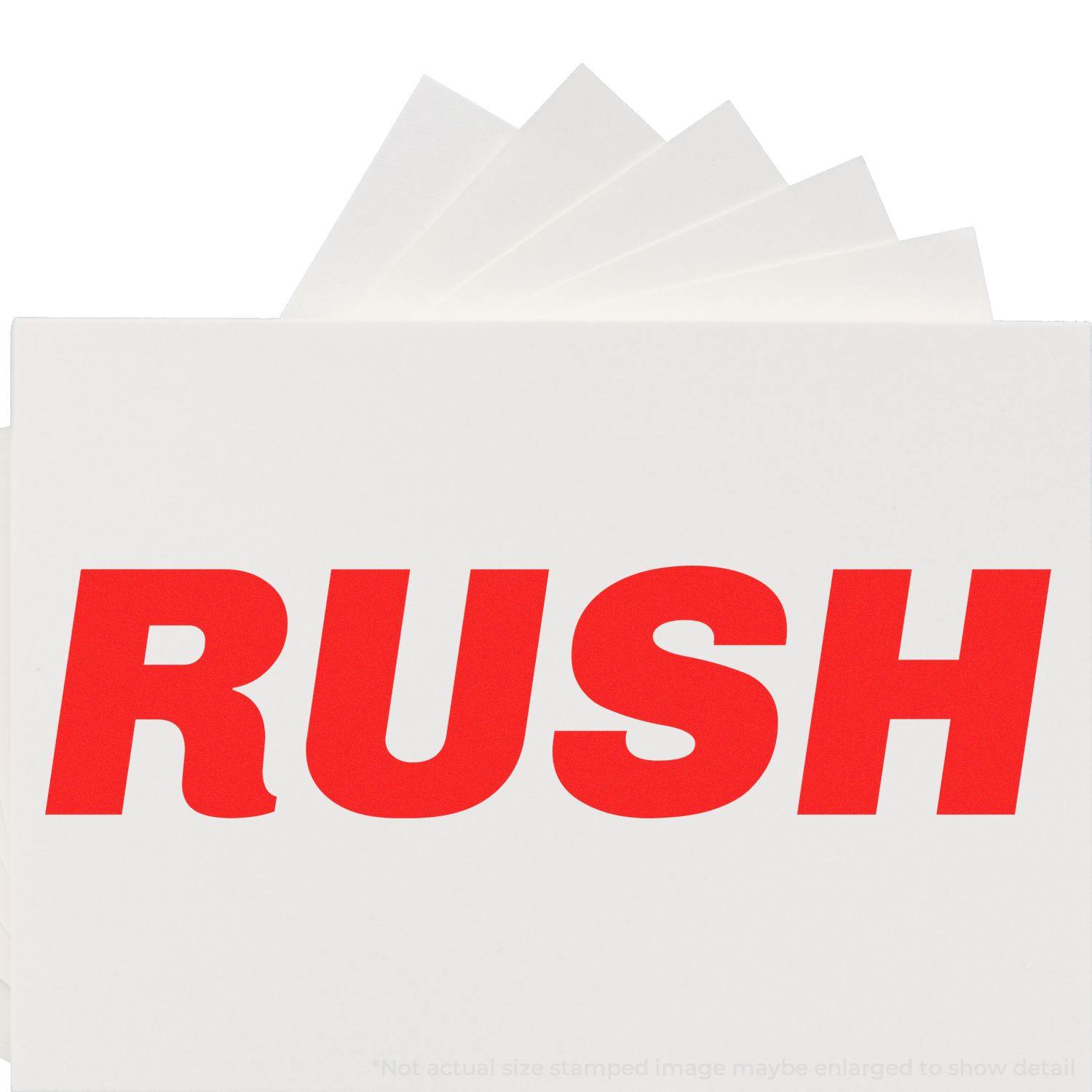 Large Self Inking Italic Rush Stamp imprinting bold red RUSH text on white paper, emphasizing urgency and importance.