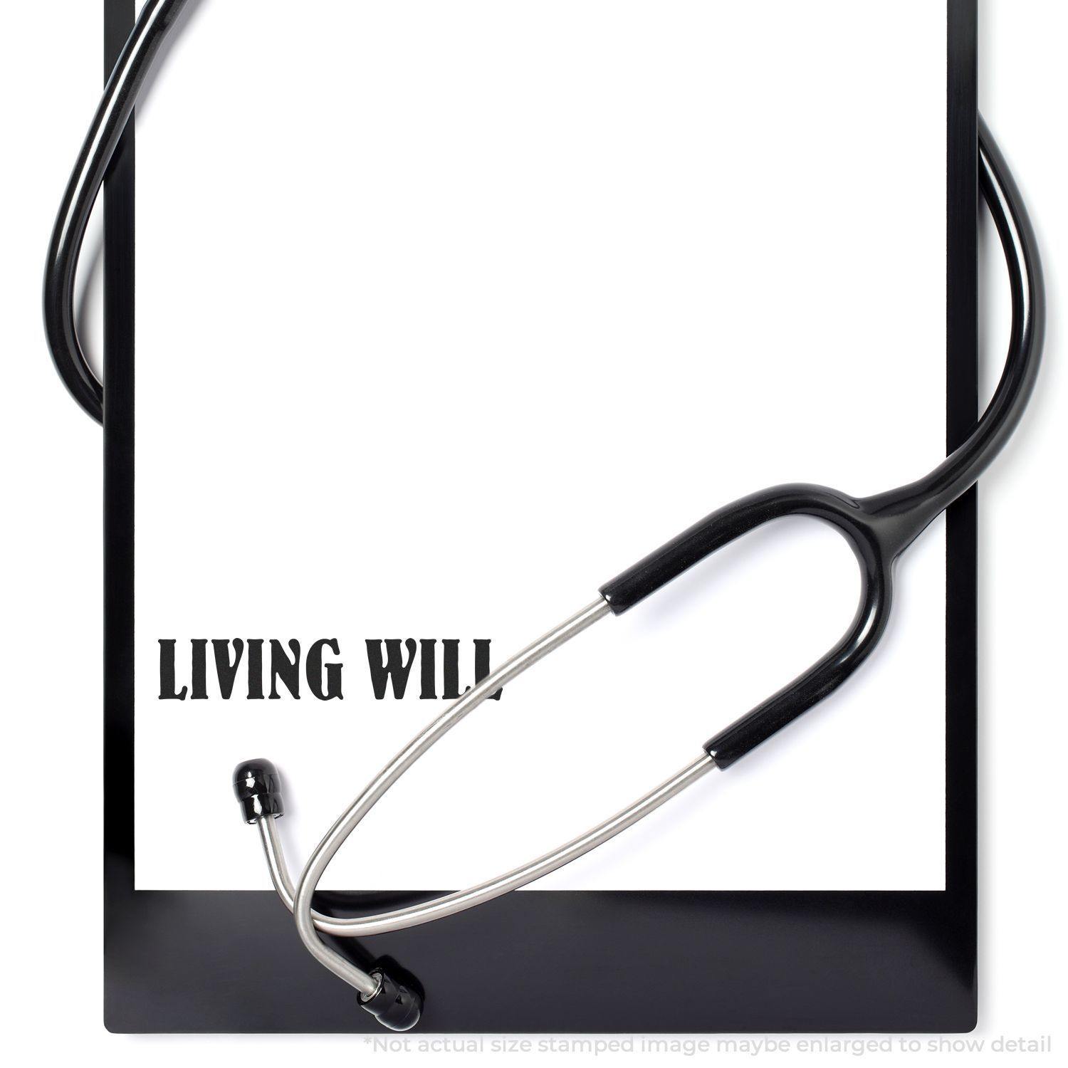 A Large Living Will Rubber Stamp imprint on a white paper with a stethoscope, indicating its use for medical or legal documentation.