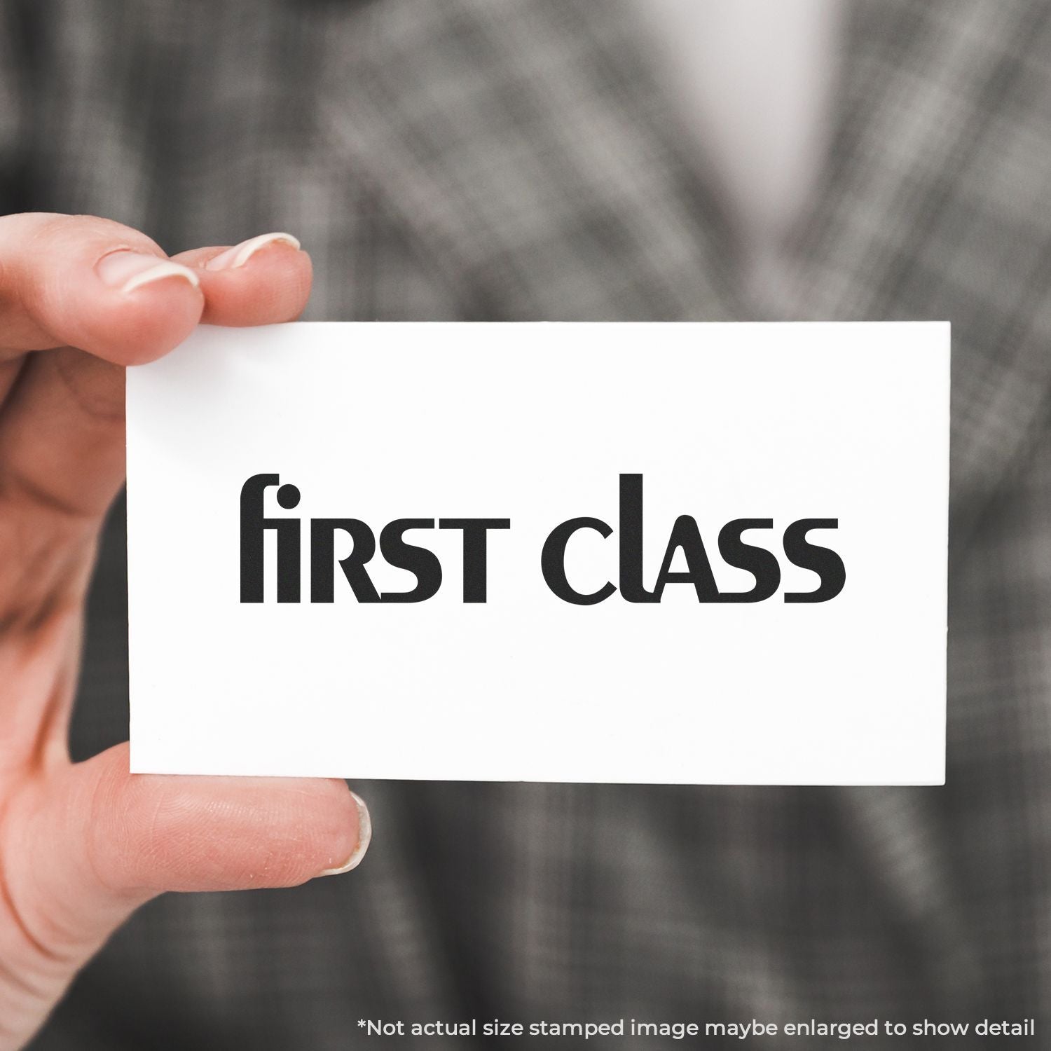 Person holding a card stamped with first class using the Self Inking Lower Case First Class Stamp.