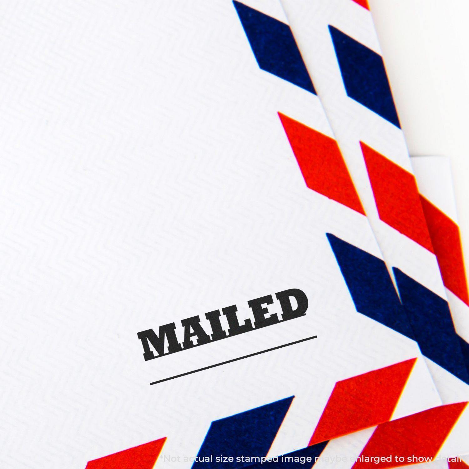 Envelope with red and blue border stamped with Mailed with Date Line Rubber Stamp in black ink.