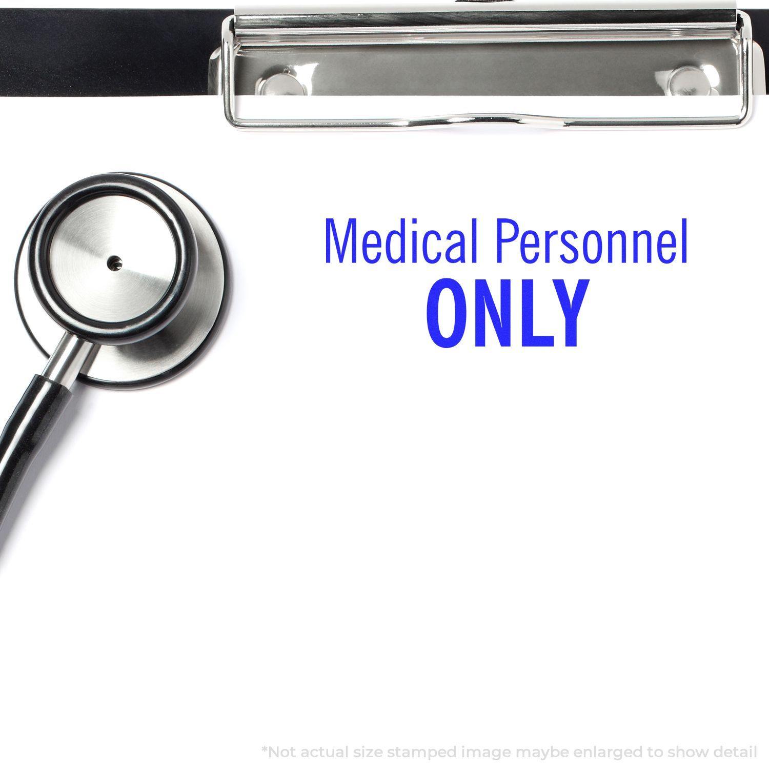 A clipboard with a stethoscope and a Medical Personnel Only stamp impression in blue ink. Product: Large Self Inking Medical Personnel Only Stamp.