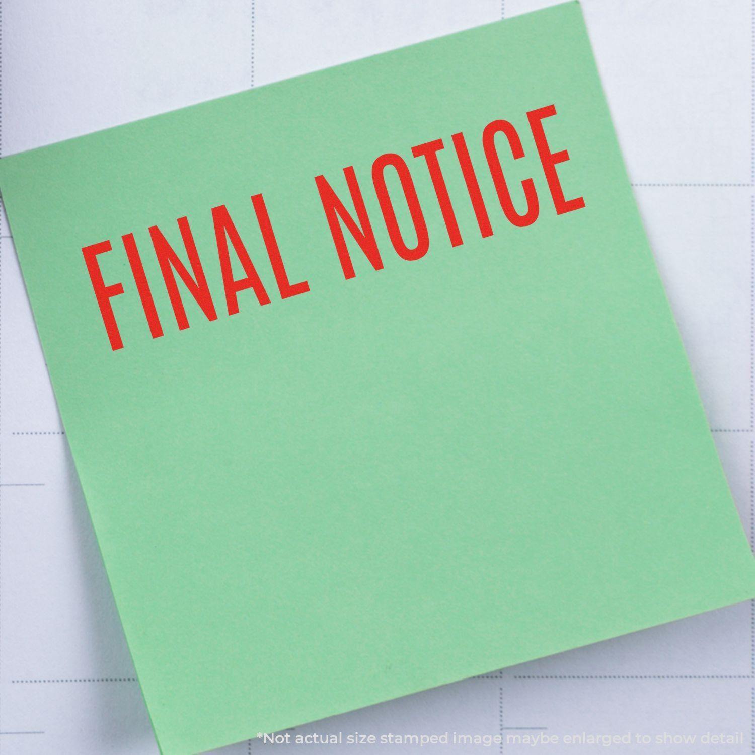 A stock office rubber stamp with a stamped image showing how the text "FINAL NOTICE" in a large narrow font is displayed after stamping.