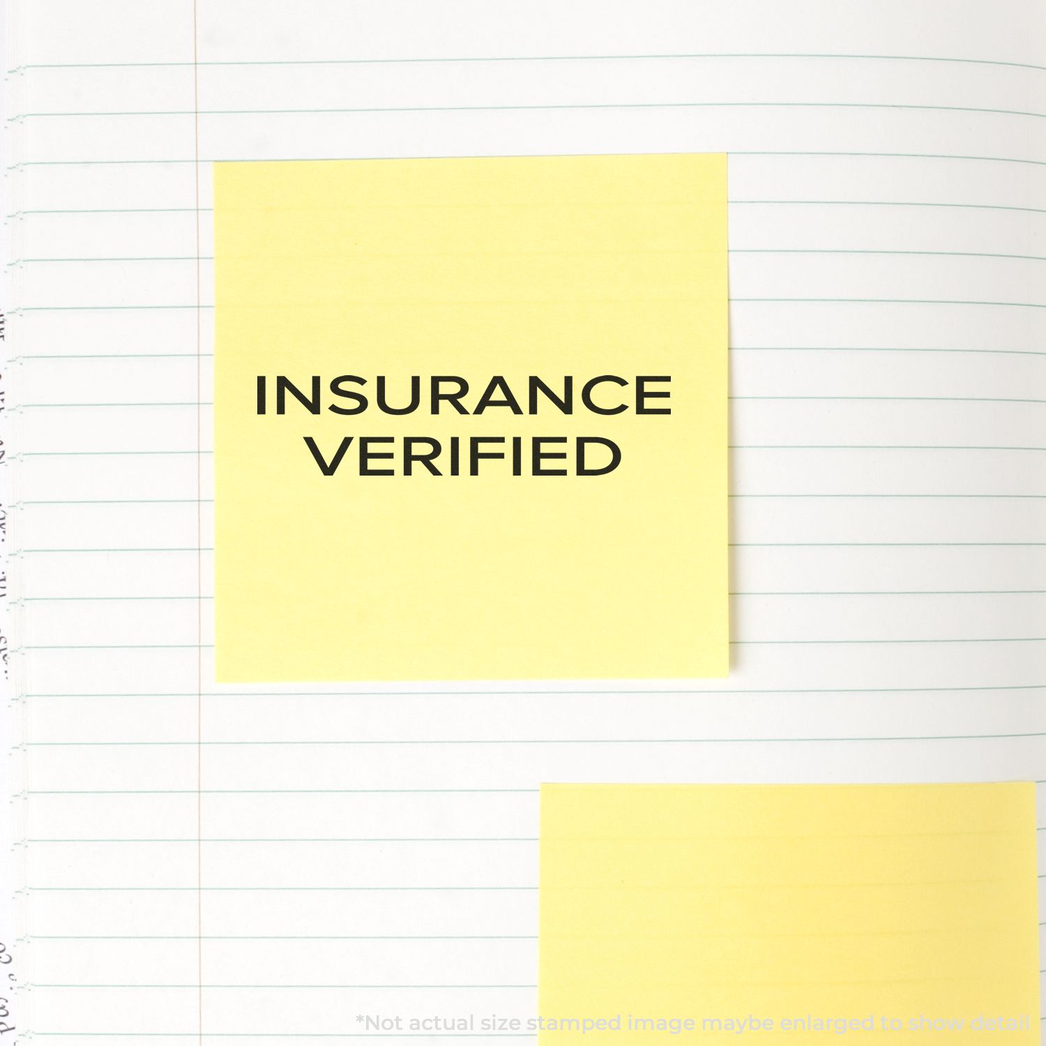 Self Inking Narrow Font Insurance Verified Stamp used on a yellow sticky note placed on a lined notebook page.