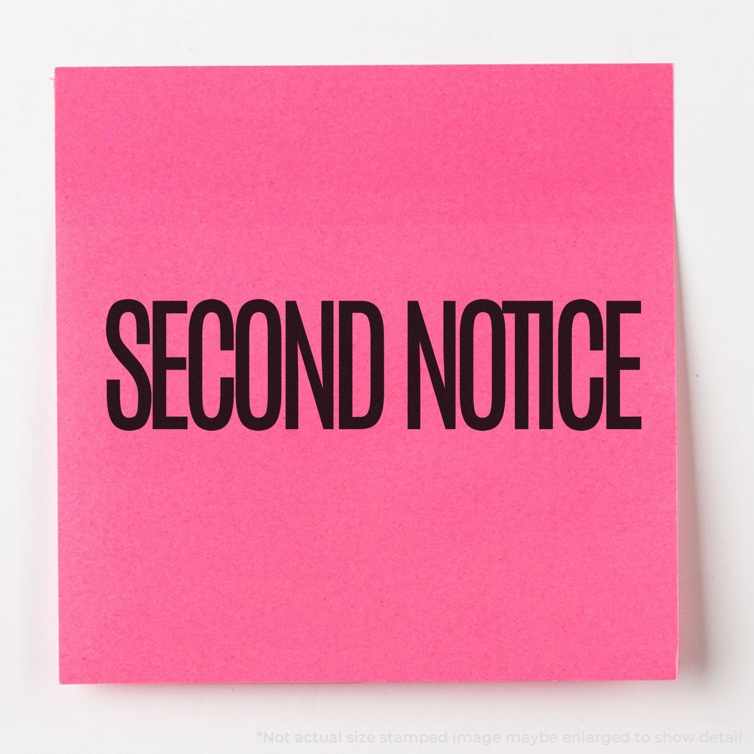 Pink paper stamped with SECOND NOTICE using the Self Inking Narrow Font Second Notice Stamp.