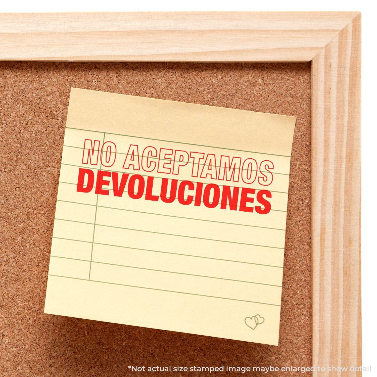 A corkboard with a note stamped NO ACEPTAMOS DEVOLUCIONES using the Large No Aceptamos Devolucions Rubber Stamp.