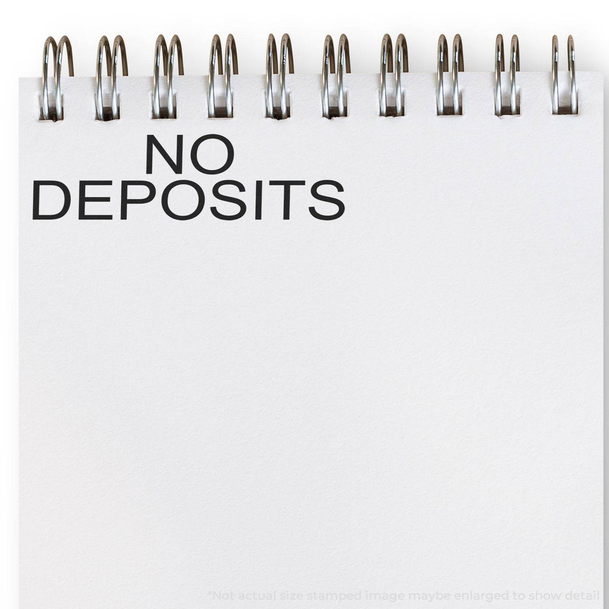 Large Pre Inked No Deposits Stamp In Use Photo