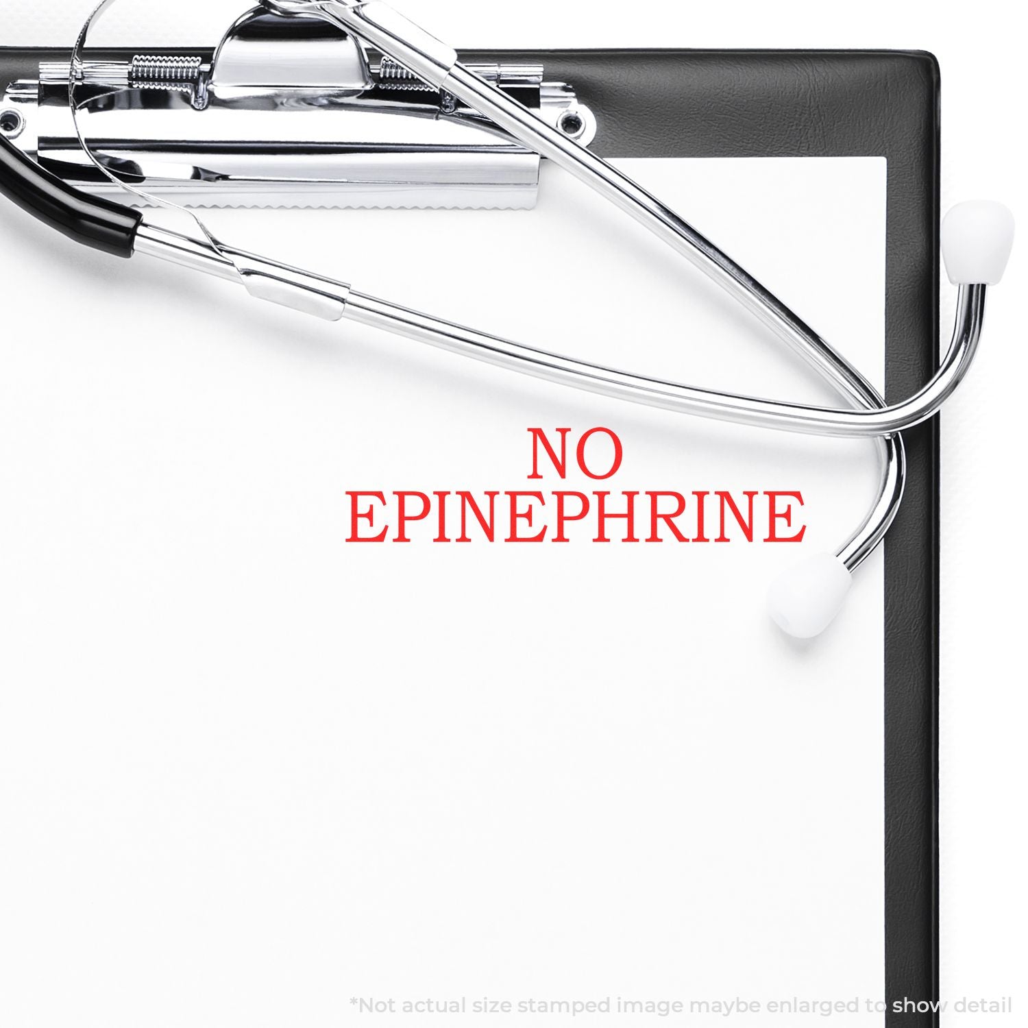 Self Inking No Epinephrine Stamp imprint on a white paper attached to a clipboard with a stethoscope placed on top.