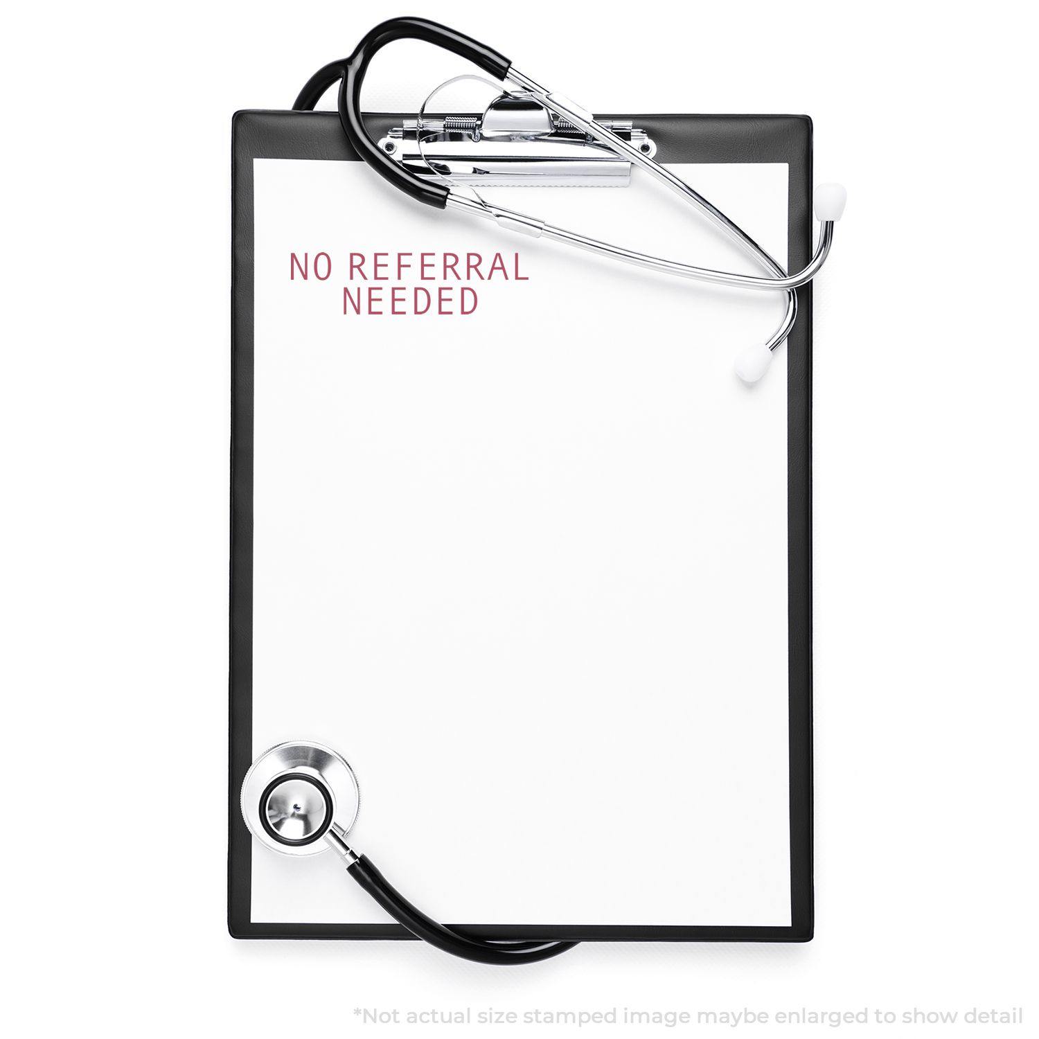 A clipboard with a stethoscope and a Large No Referral Needed Rubber Stamp imprint in red on the paper.