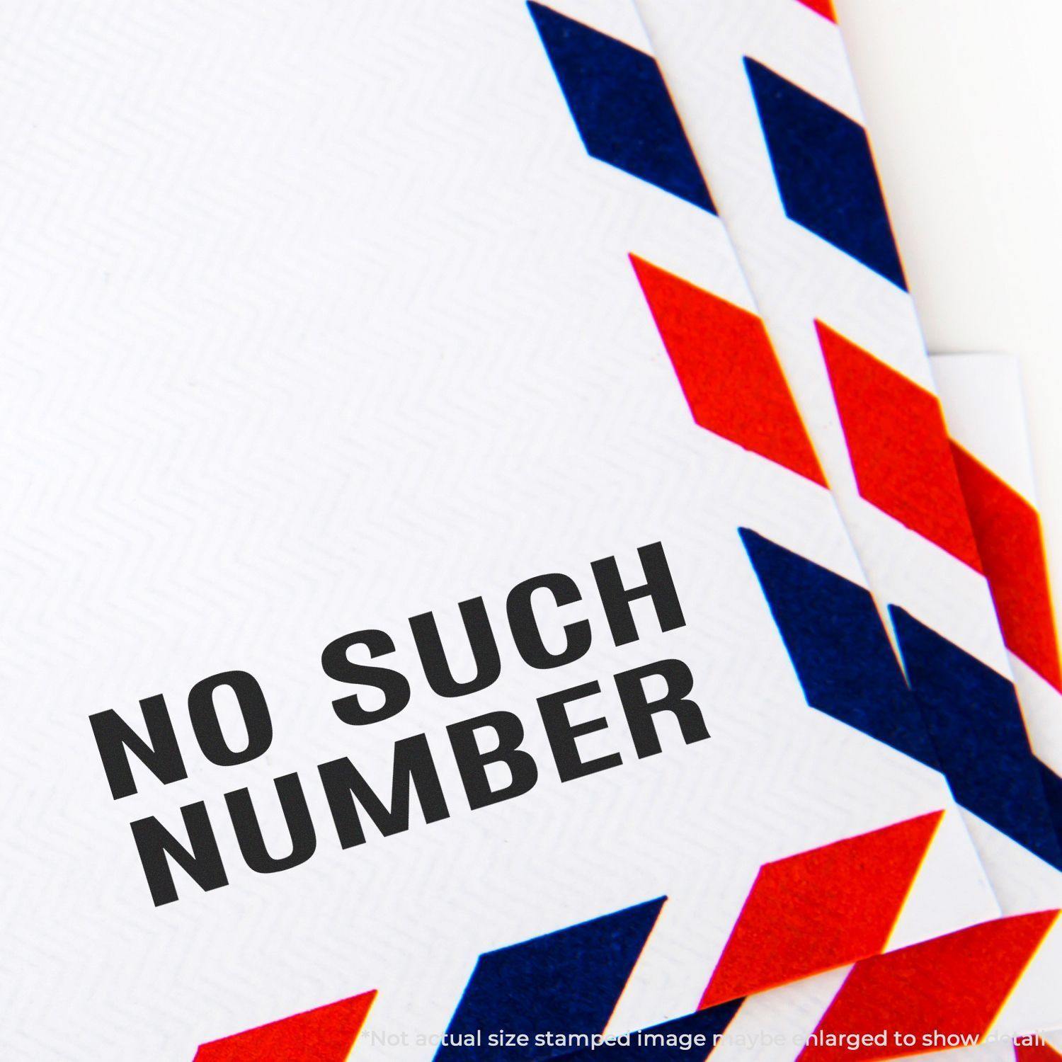 No Such Number rubber stamp on white paper with red and blue chevron border, indicating an incorrect address.