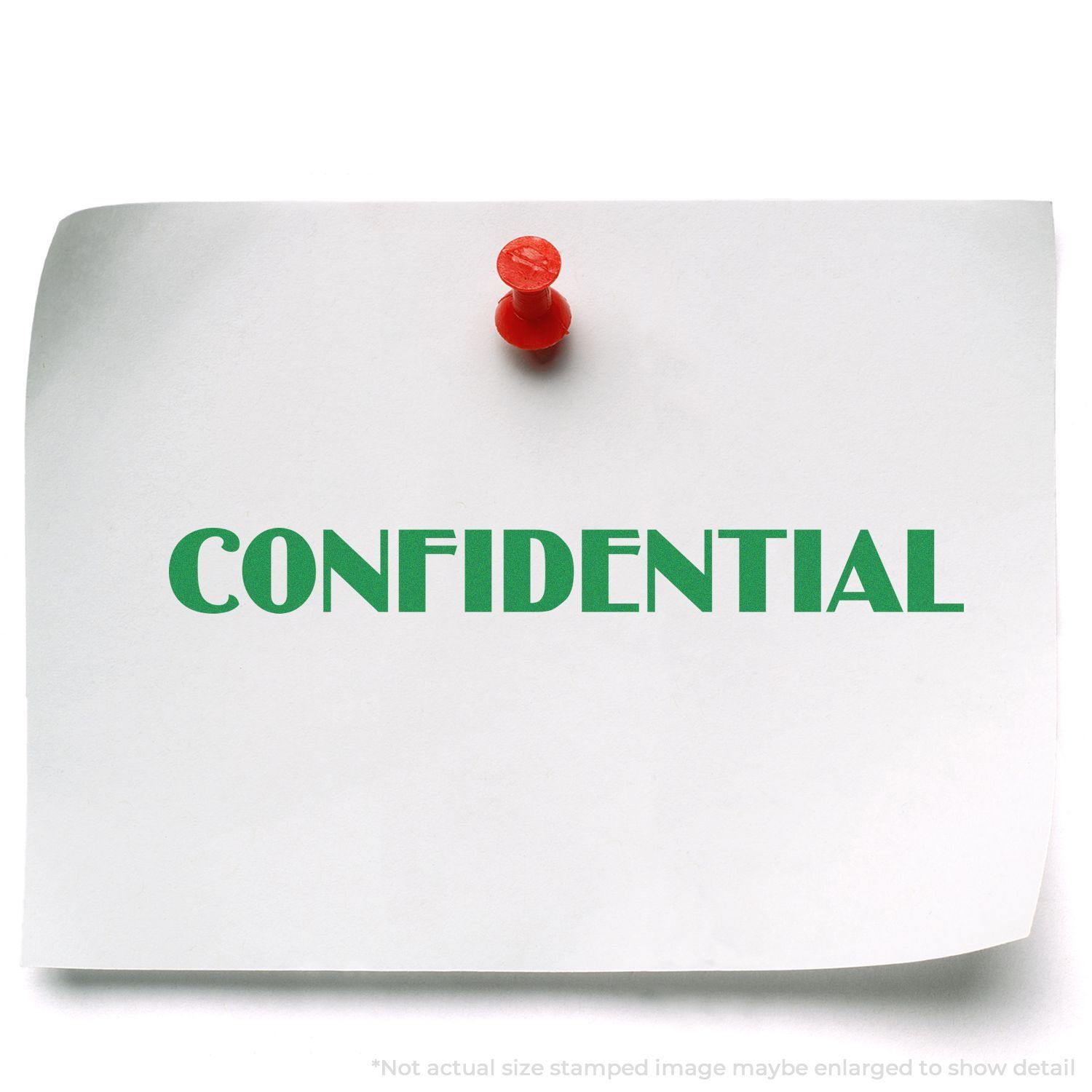 A white paper with CONFIDENTIAL stamped in green using an Optima Confidential Rubber Stamp, pinned with a red pushpin.