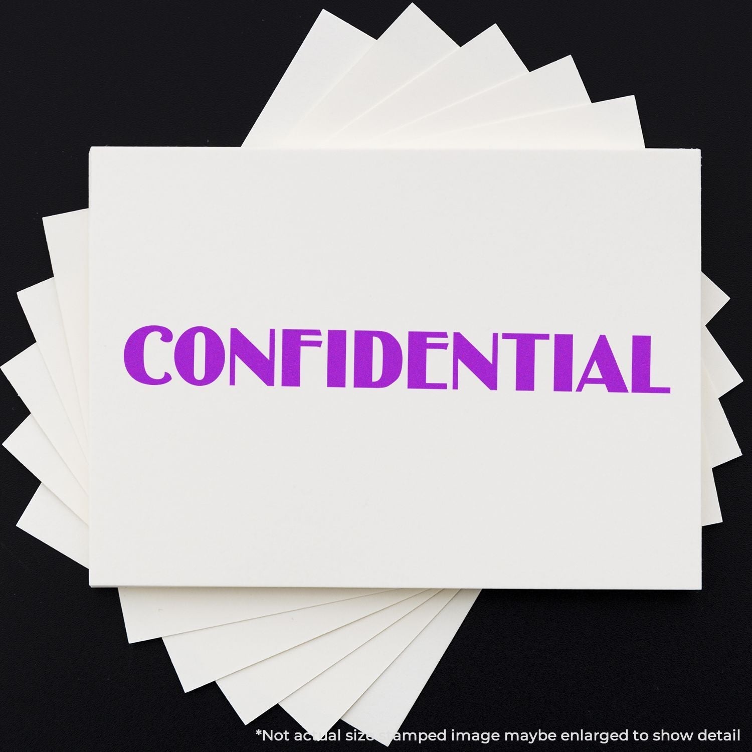 Self Inking Optima Confidential Stamp in use, displaying the word CONFIDENTIAL in bold purple letters on a stack of white papers.