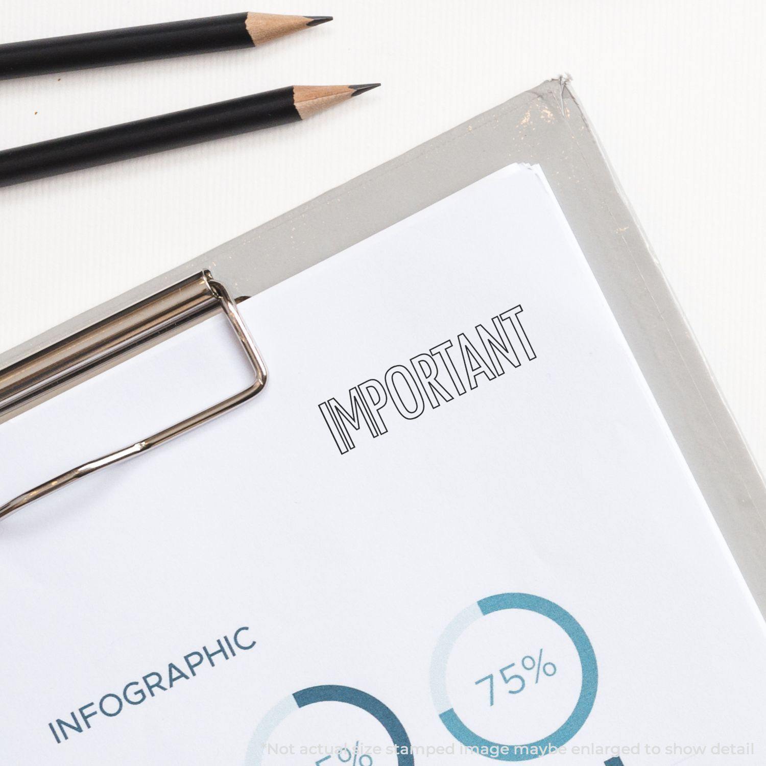 Outline Important rubber stamp on a document with graphs, next to two pencils and a clipboard.