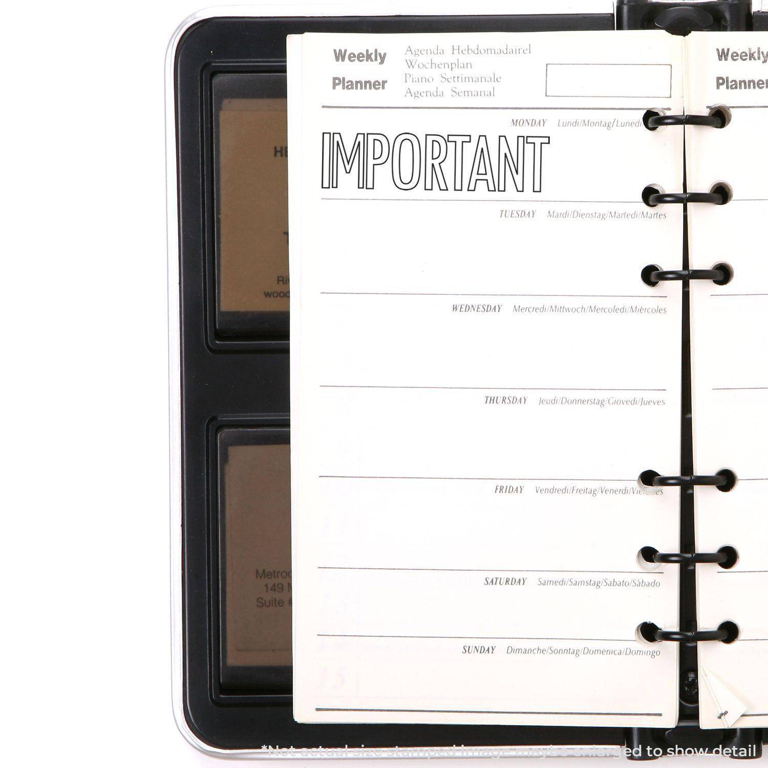 Weekly planner with IMPORTANT stamped using the Large Pre-Inked Outline Important Stamp, highlighting a significant note on Monday.