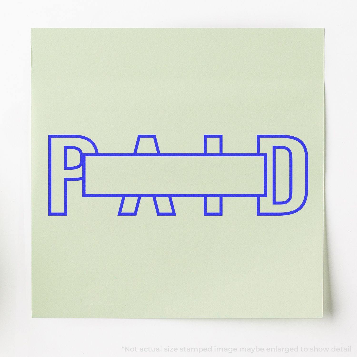 Large Pre-Inked Outline Paid with Box Stamp in blue ink on a light green paper, showing the word PAID with a box in the center.