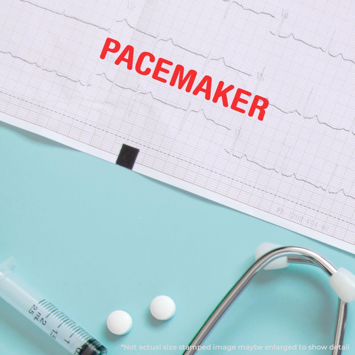 Pacemaker rubber stamp in red ink on an ECG paper, with a stethoscope, syringe, and pills on a light blue background.