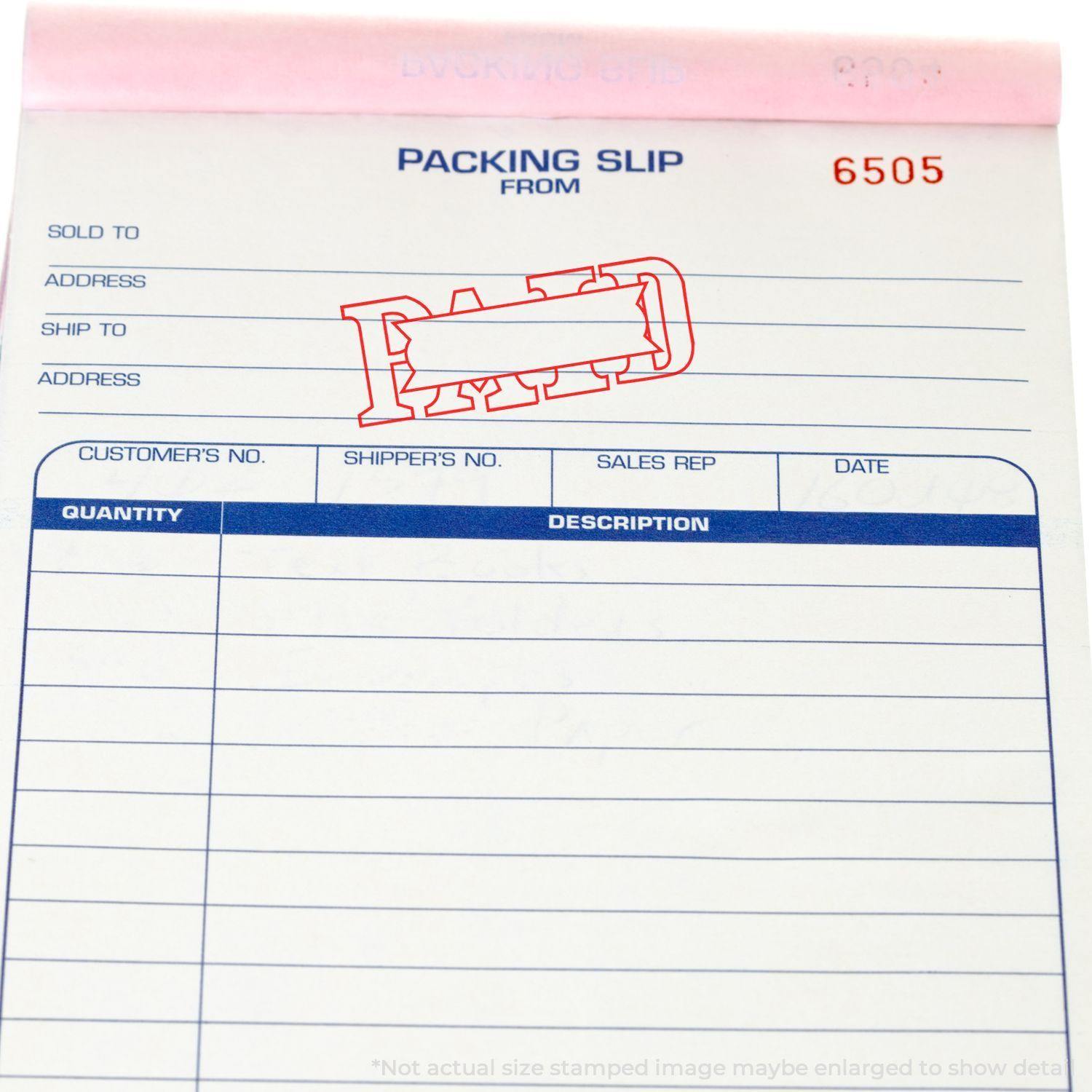 A stock office rubber stamp with a stamped image showing how the text "PAID" in a large outline font with a small box in the center of the text is displayed after stamping.